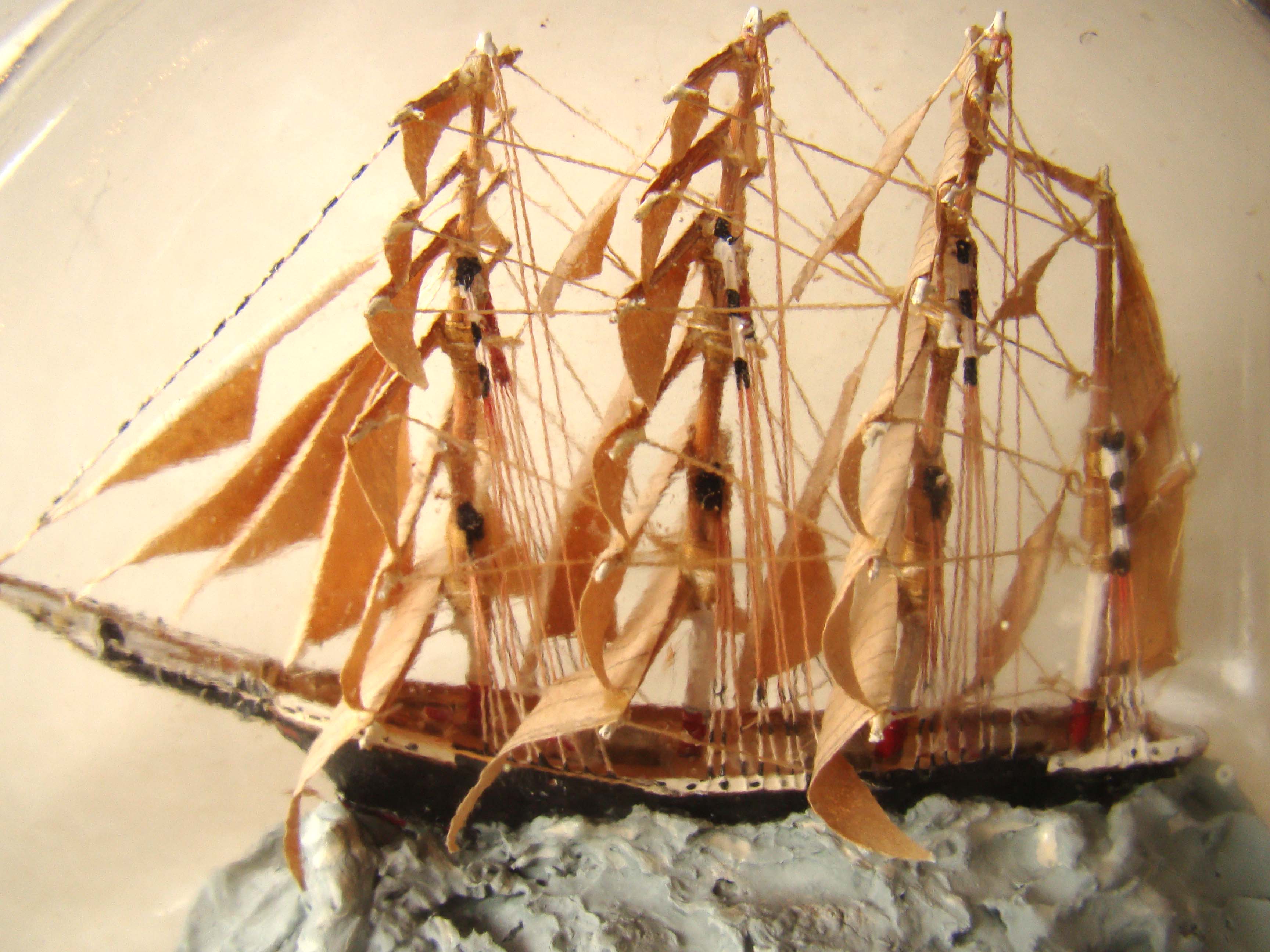 An extremely well detailed vintage ship-in- bottle circa 1940