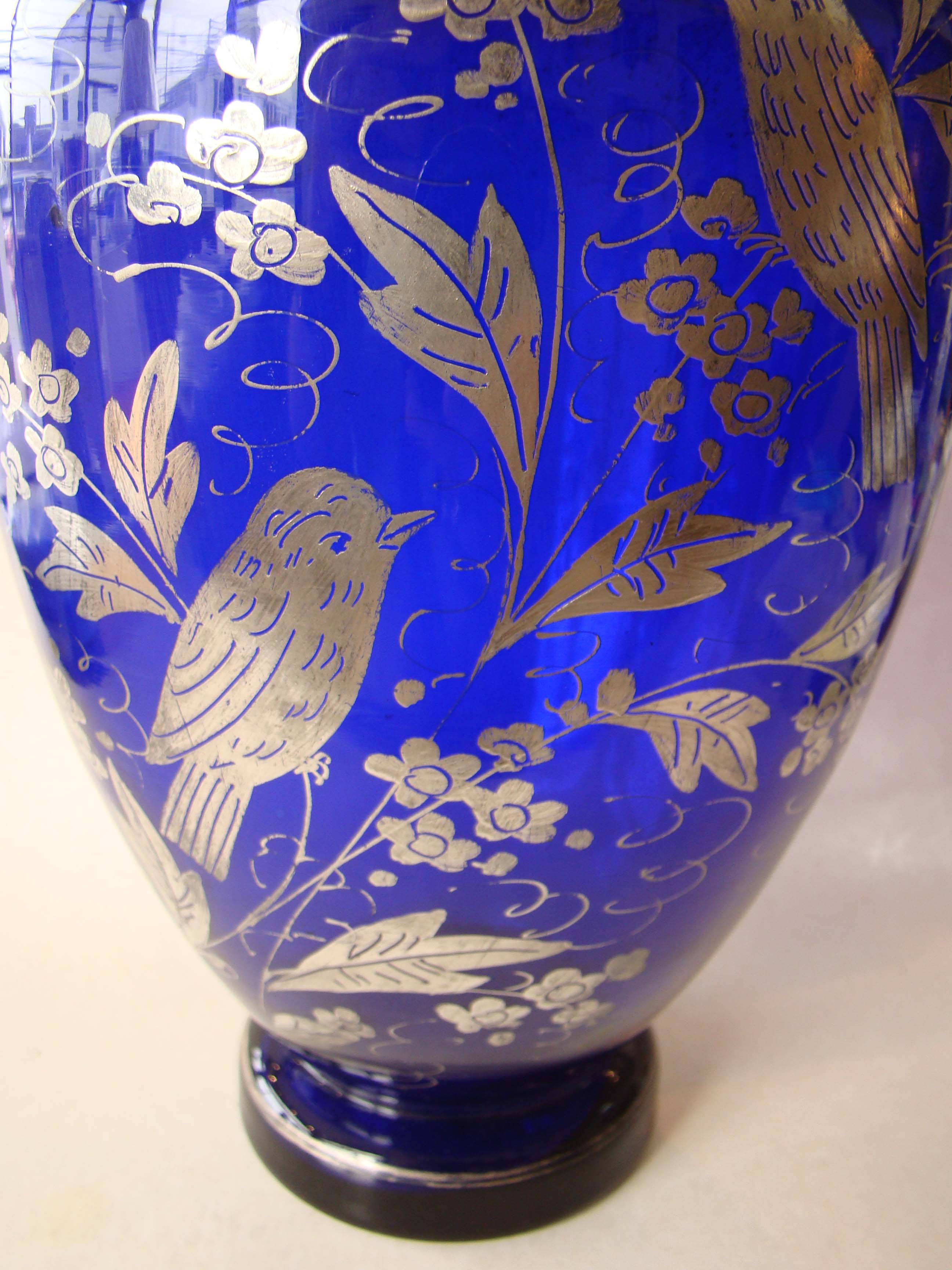 A stunning vintage colbalt blue silver overlay vase