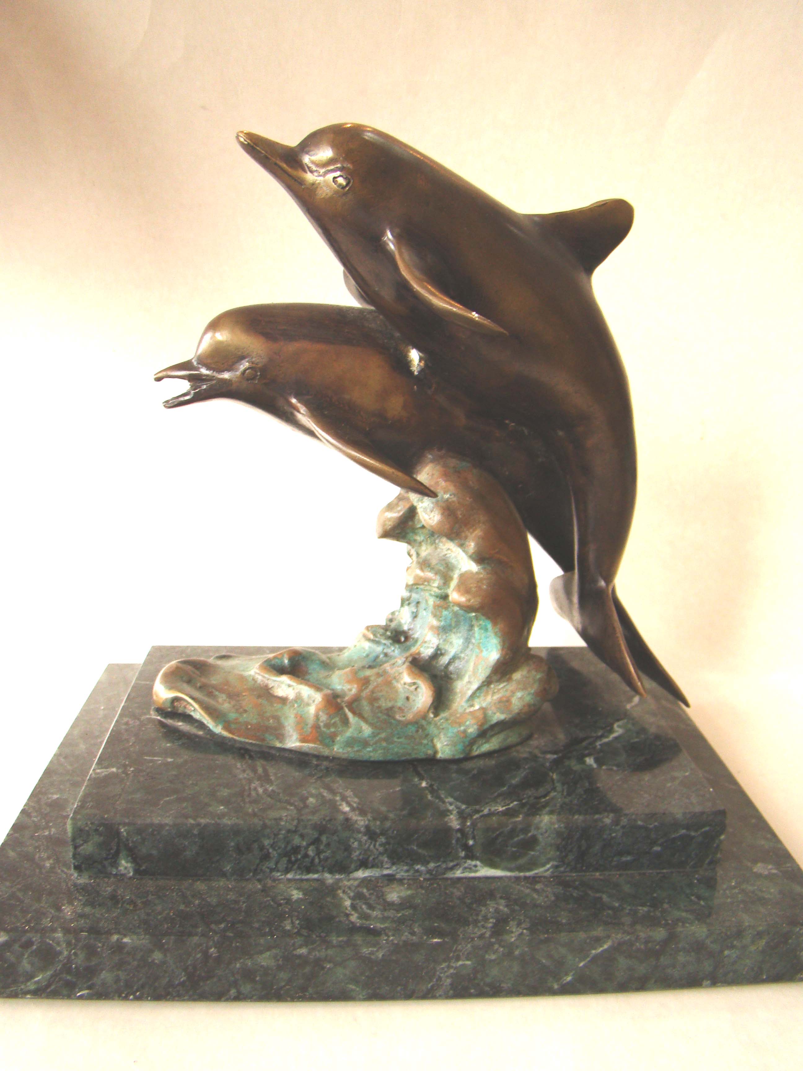 A wonderful solid bronze sculpture depicting two dolphins mounted on a green marble base — image 3