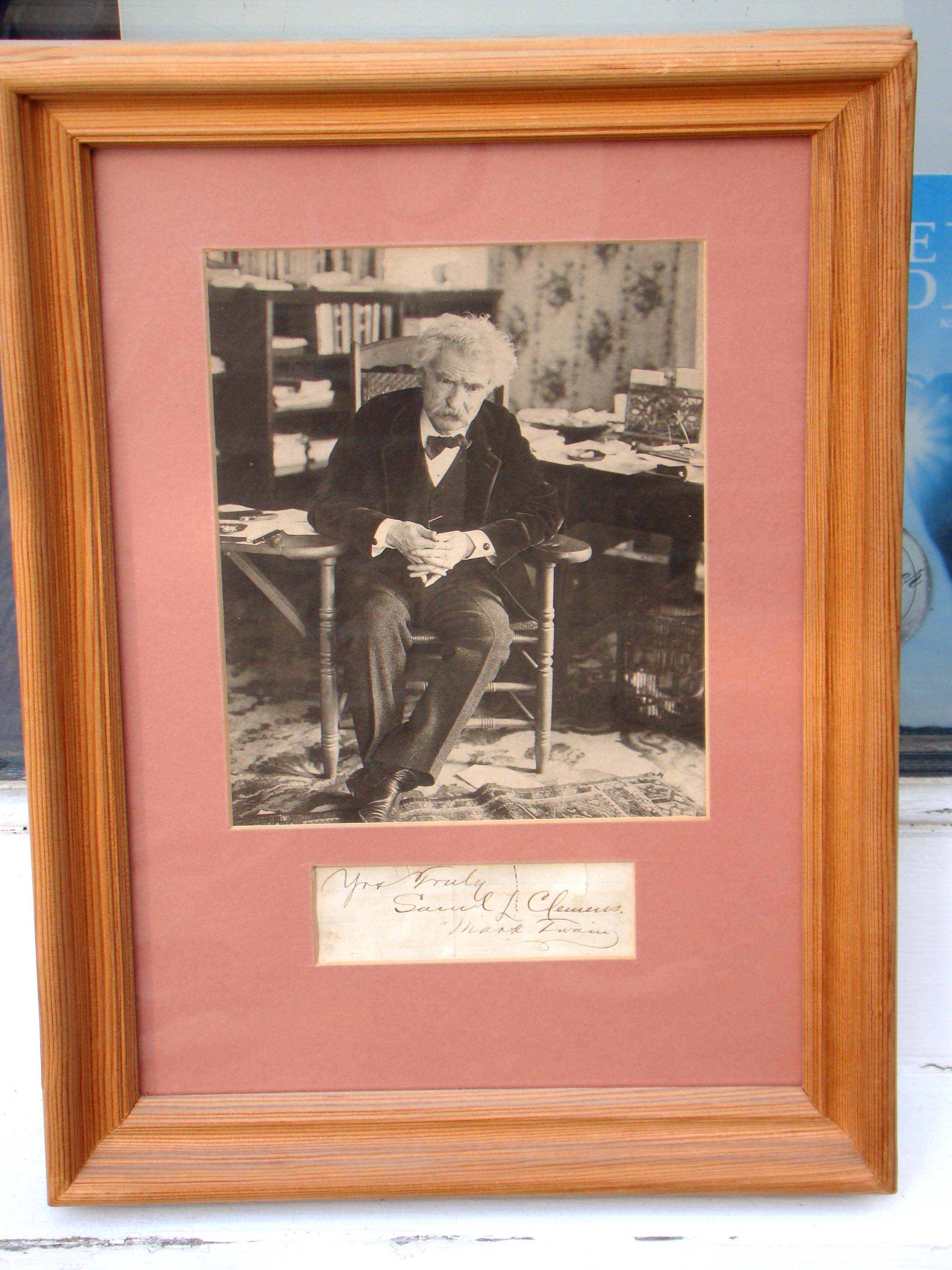 A fine and rare photograph of Mark Twain (Samuel L. Clemens) along with a clipped signature signed "Yos truly, Samuel L. Clemens, Mark Twain" — image 3