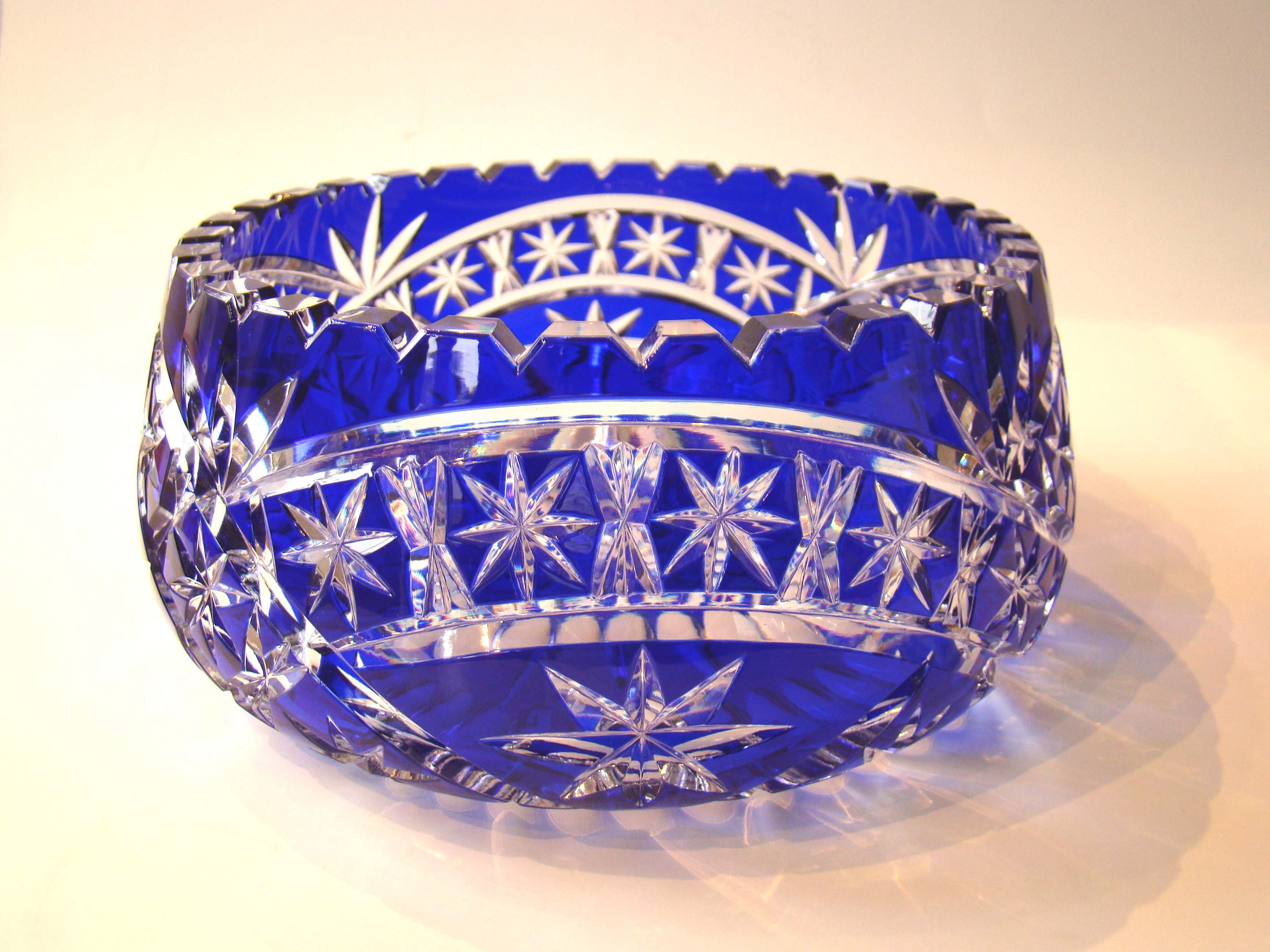 A stunningly beautiful cobalt cut to clear glass bowl.