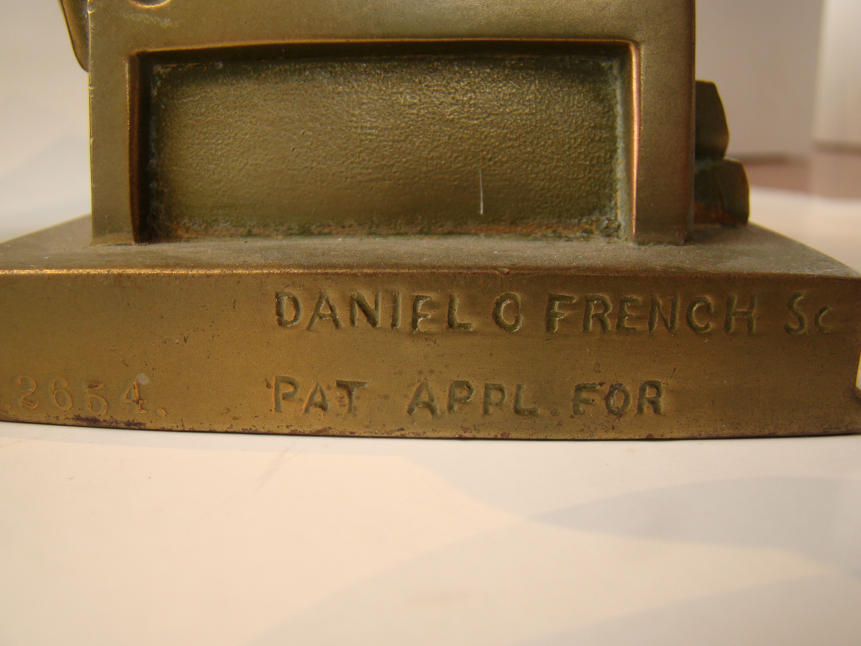 A fine pair of John Harvard bookends produced by Jennings Brothers circa 1930 — image 3
