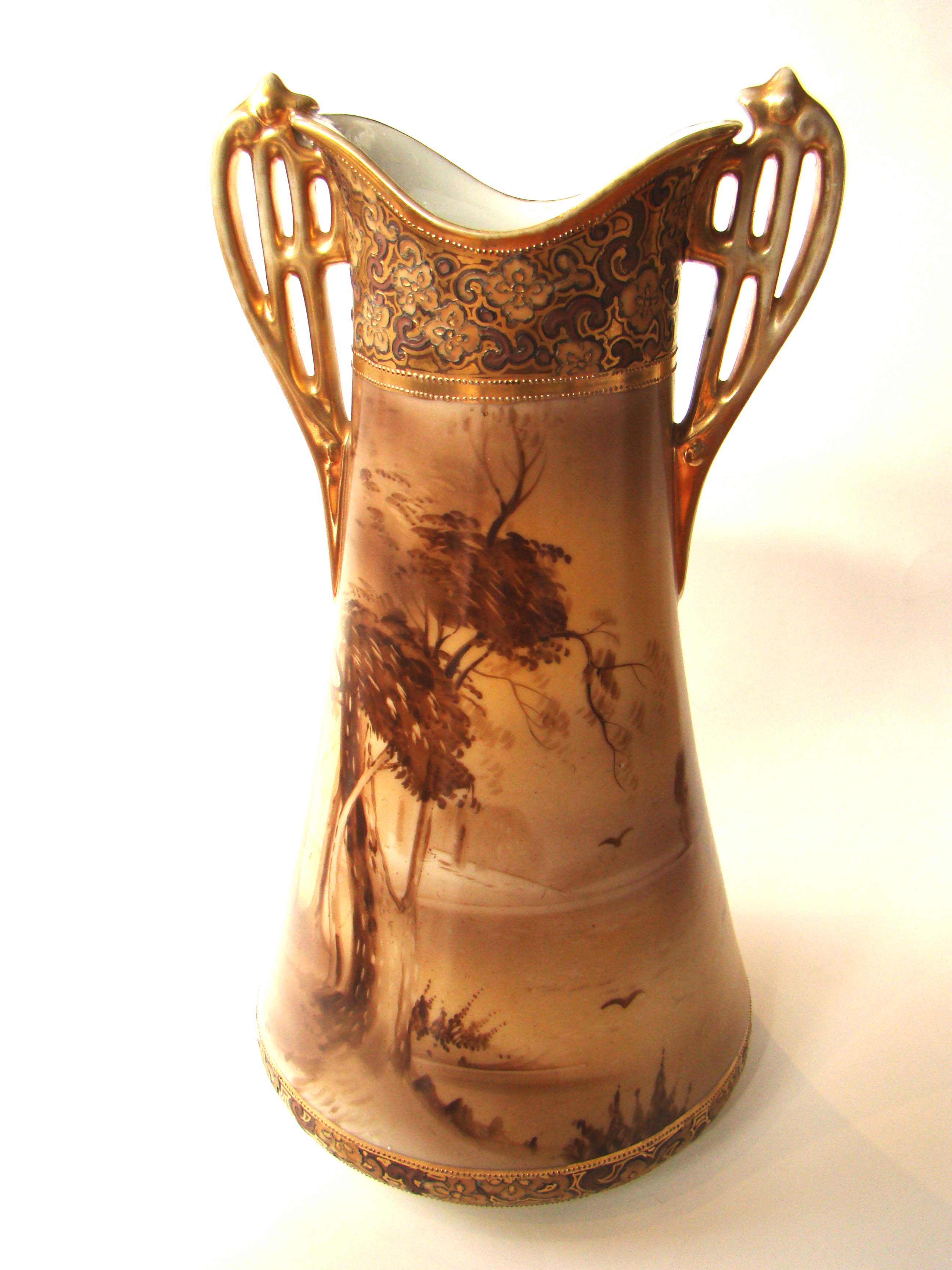 A fabulous vintage hand painted NIPPON two handled vase with gilt decoration circa 1900