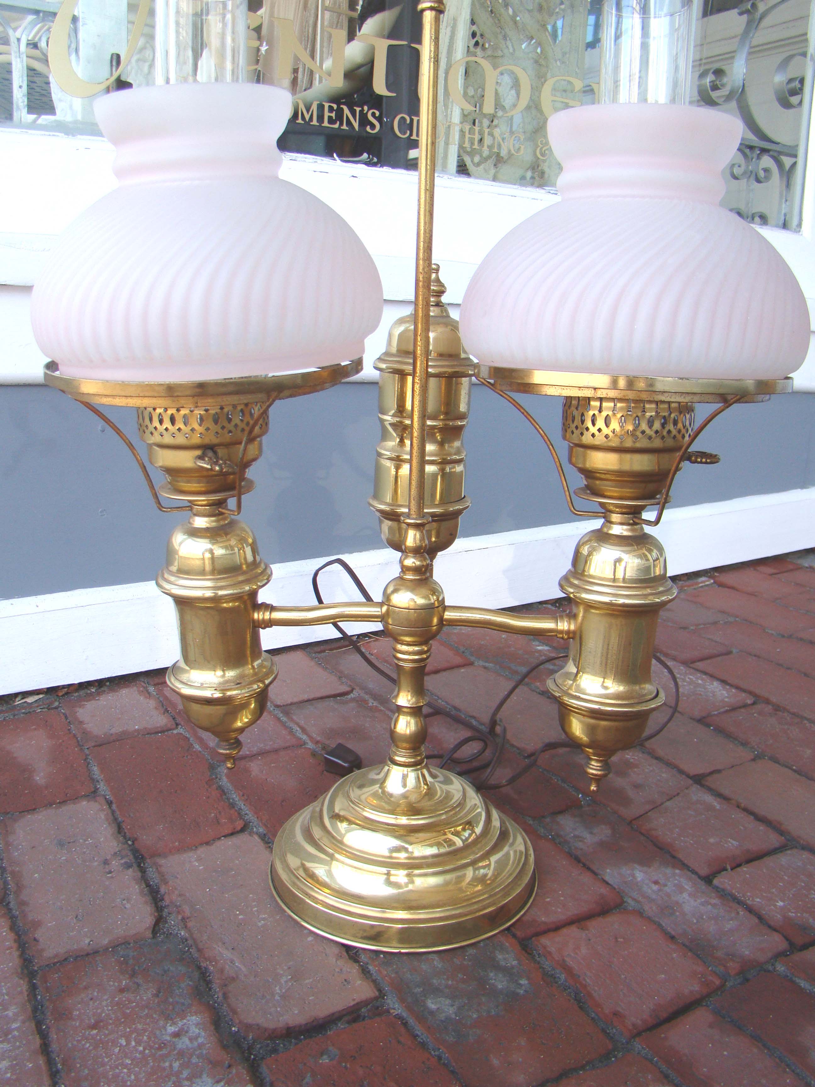 A vintage brass 'double' student lamp