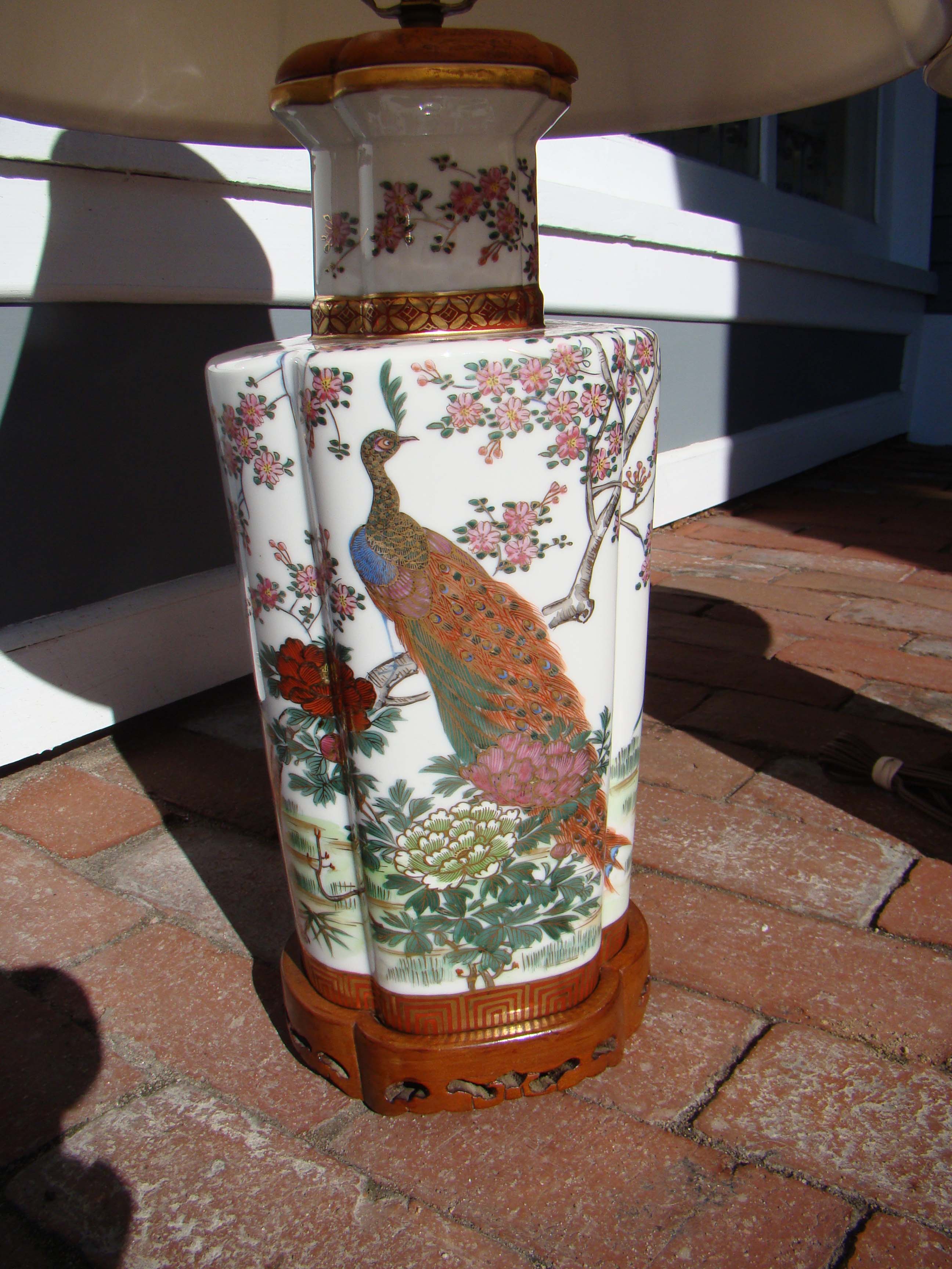 An extremely attractive pair of vintage teakwood mounted Asian lamps — image 3