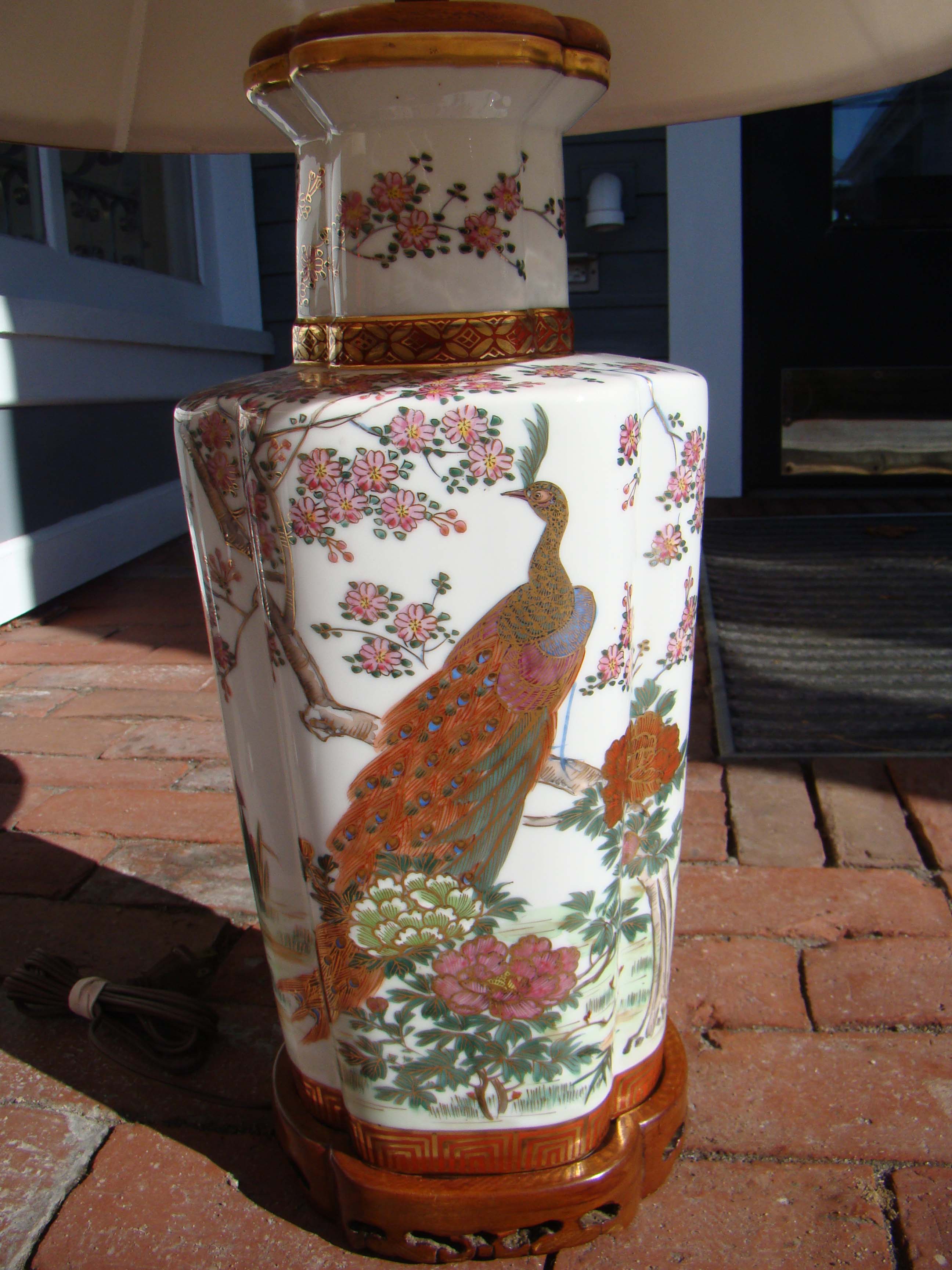 An extremely attractive pair of vintage teakwood mounted Asian lamps — image 2