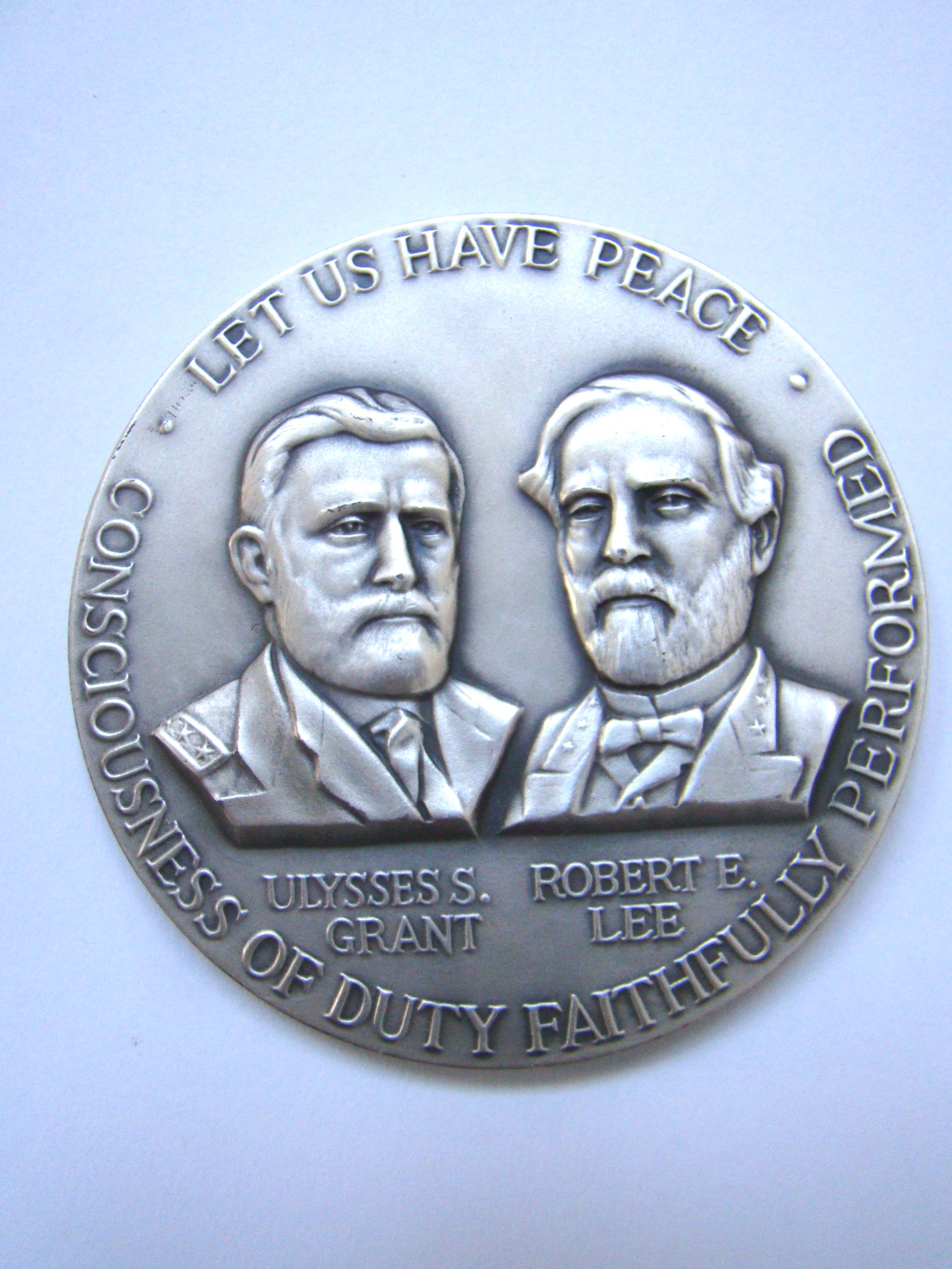 A pair of 1961-1965 Civil War Centennial .999 pure silver medals weighing 4.25 ounces each and having a 2 1/2" diameter