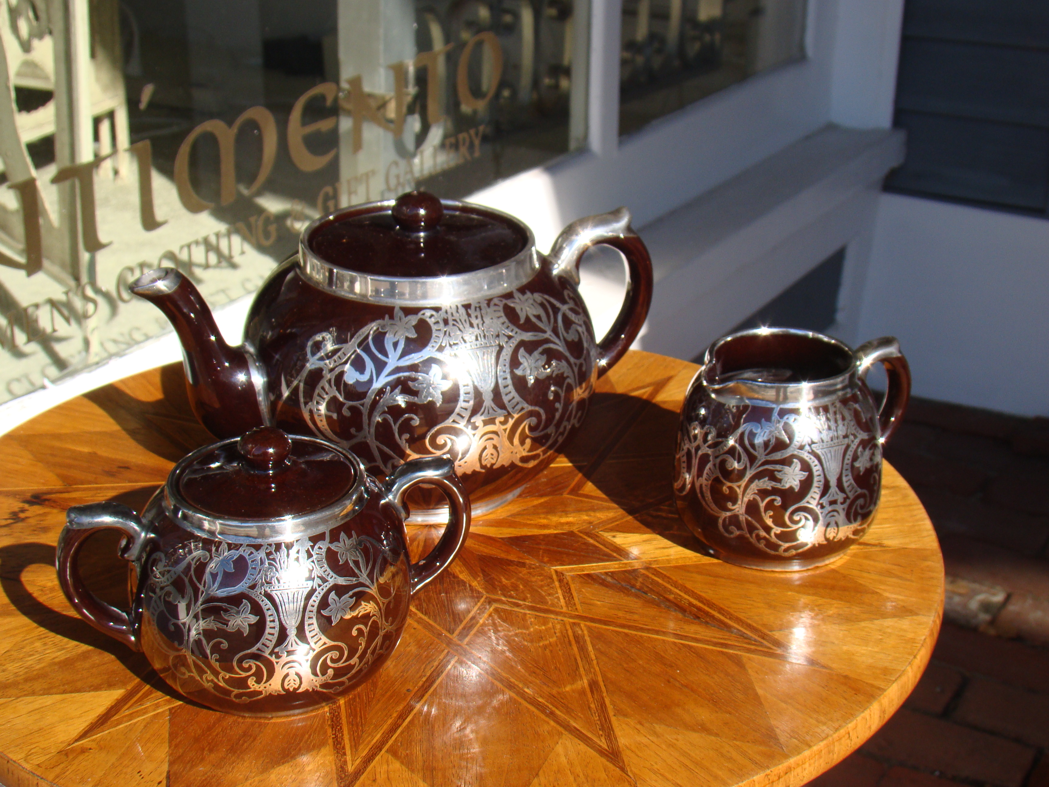 A stunning vintage Art Nouveau period silver overlay teapot, creamer and sugar by Gibsons — image 2