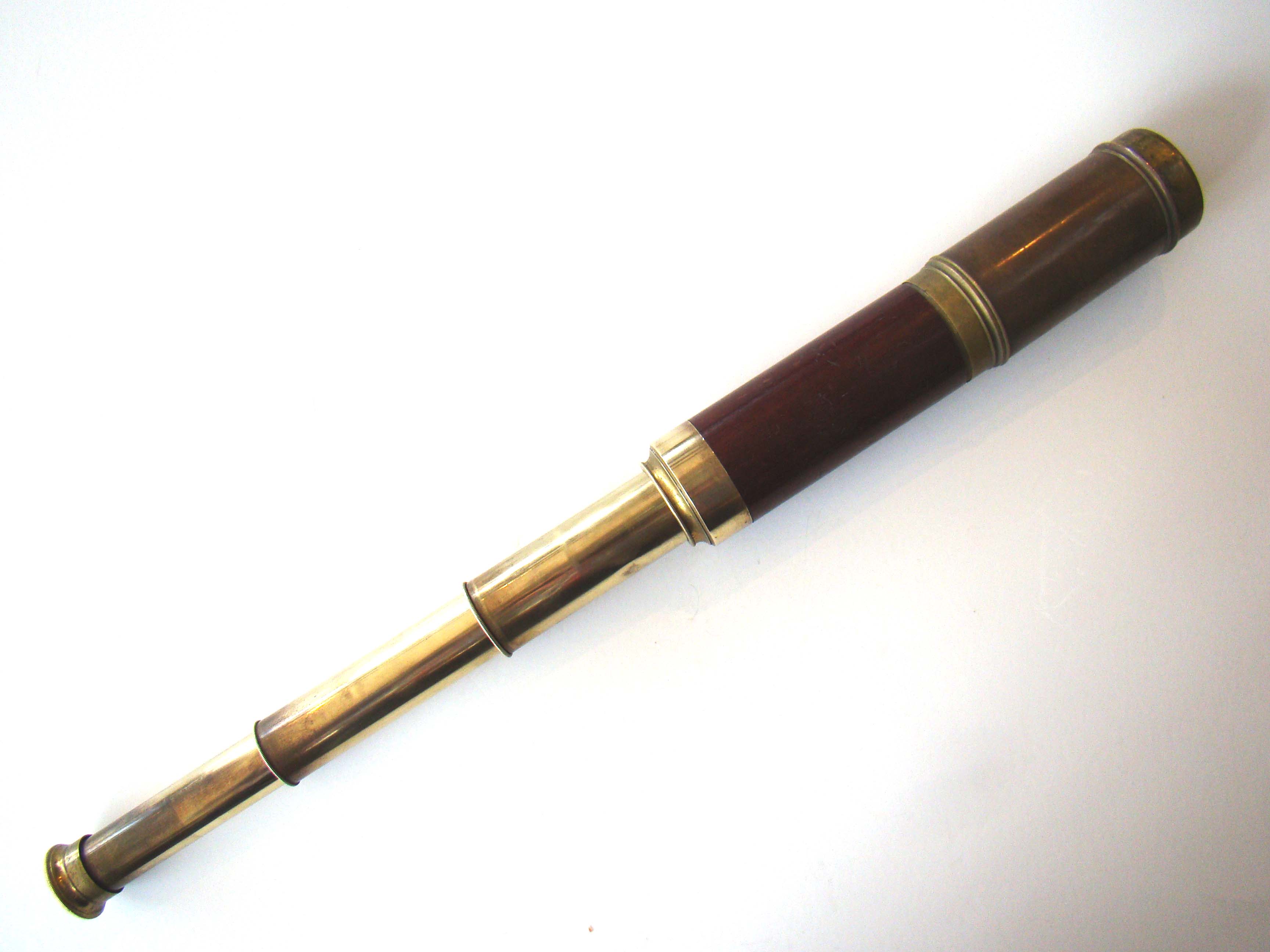 A fine antique Captain's three-draw spyglass with mahogany barrel circa 1840