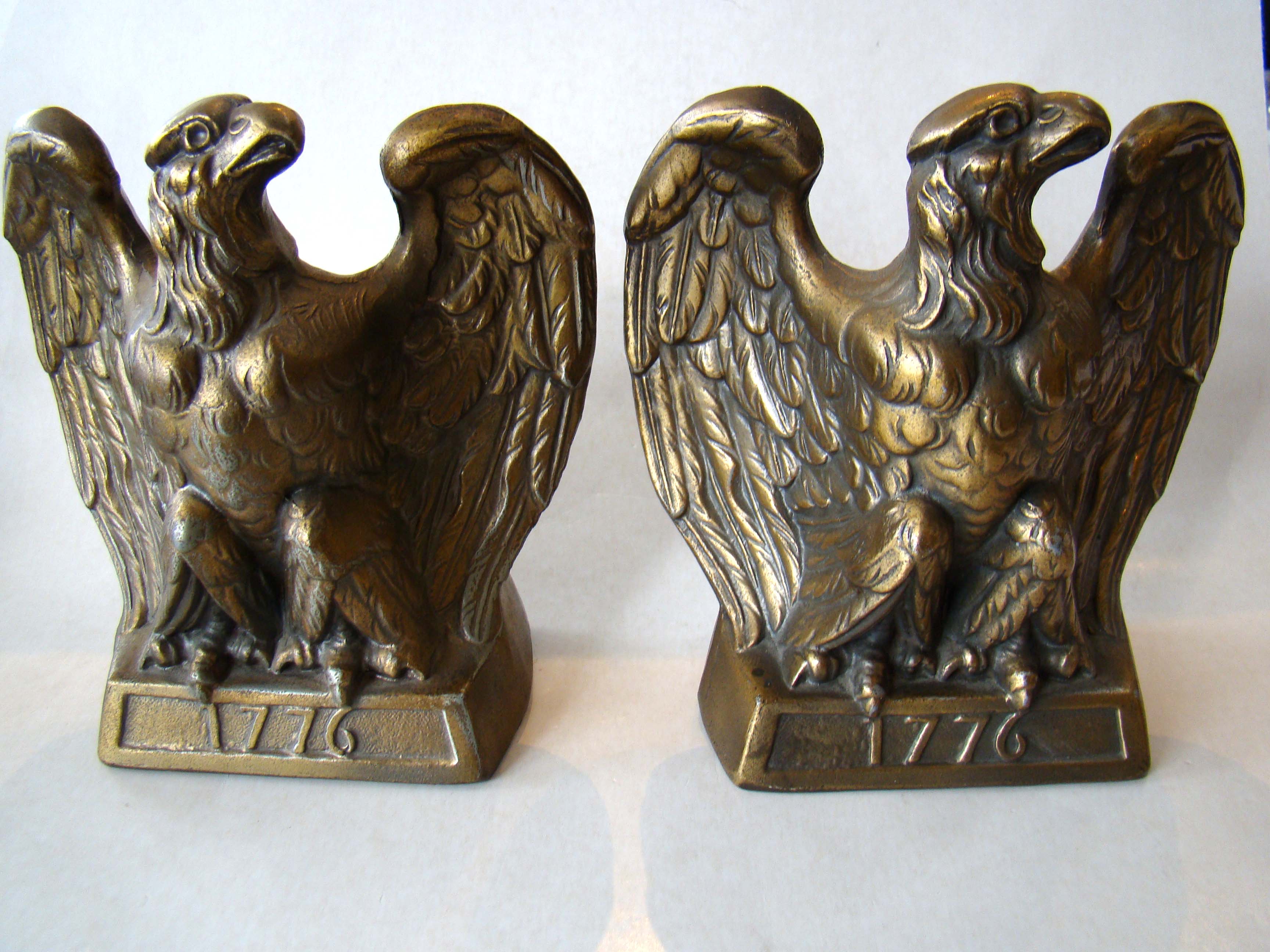 A pair of brass patriotic "!776" American spread wing eagle bookends