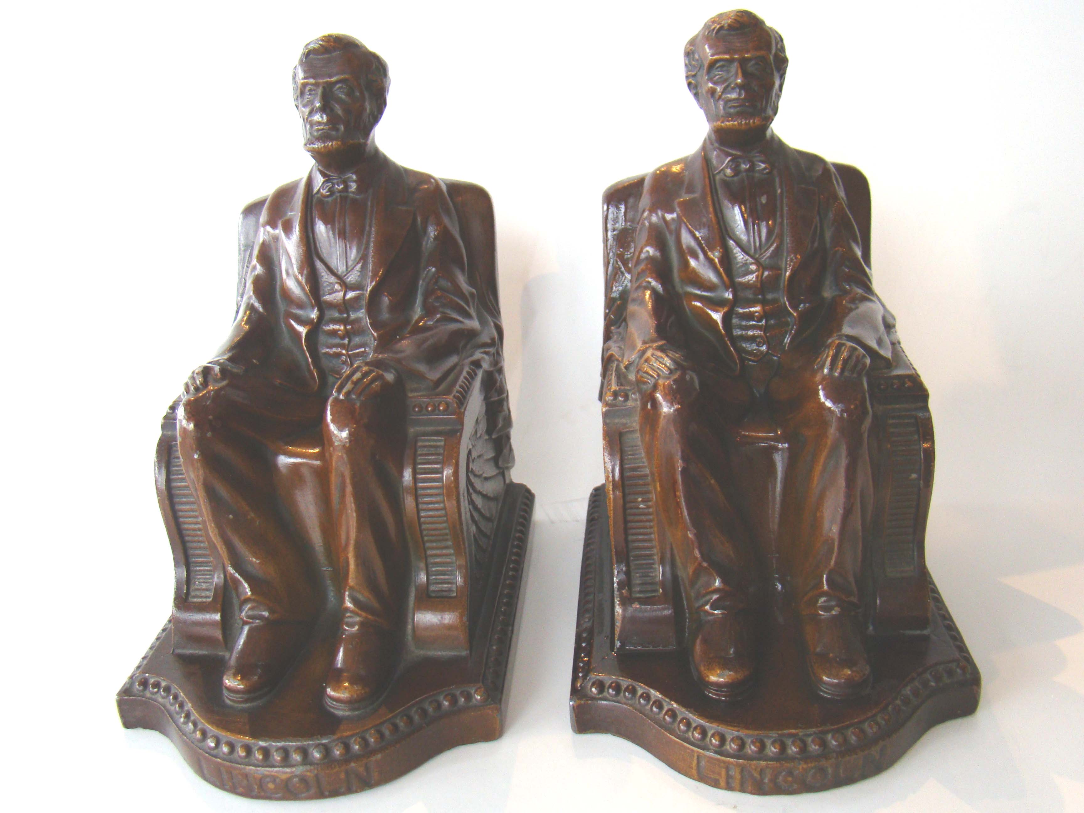 A pair of "Lincoln in the chair" bookends made by Nuart in 1924