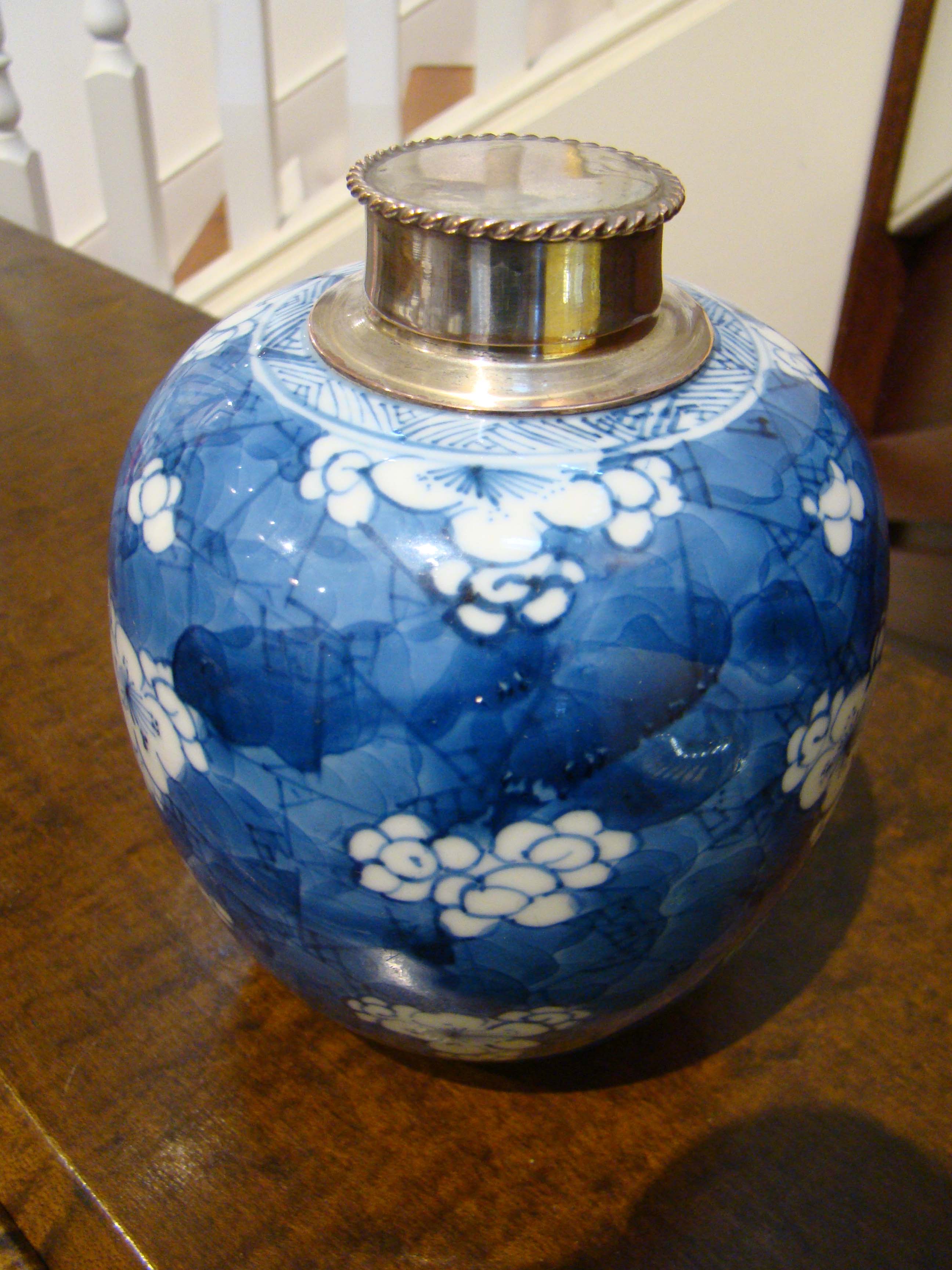 A late 18th century silver mounted Chinese jar in the Kangxi style