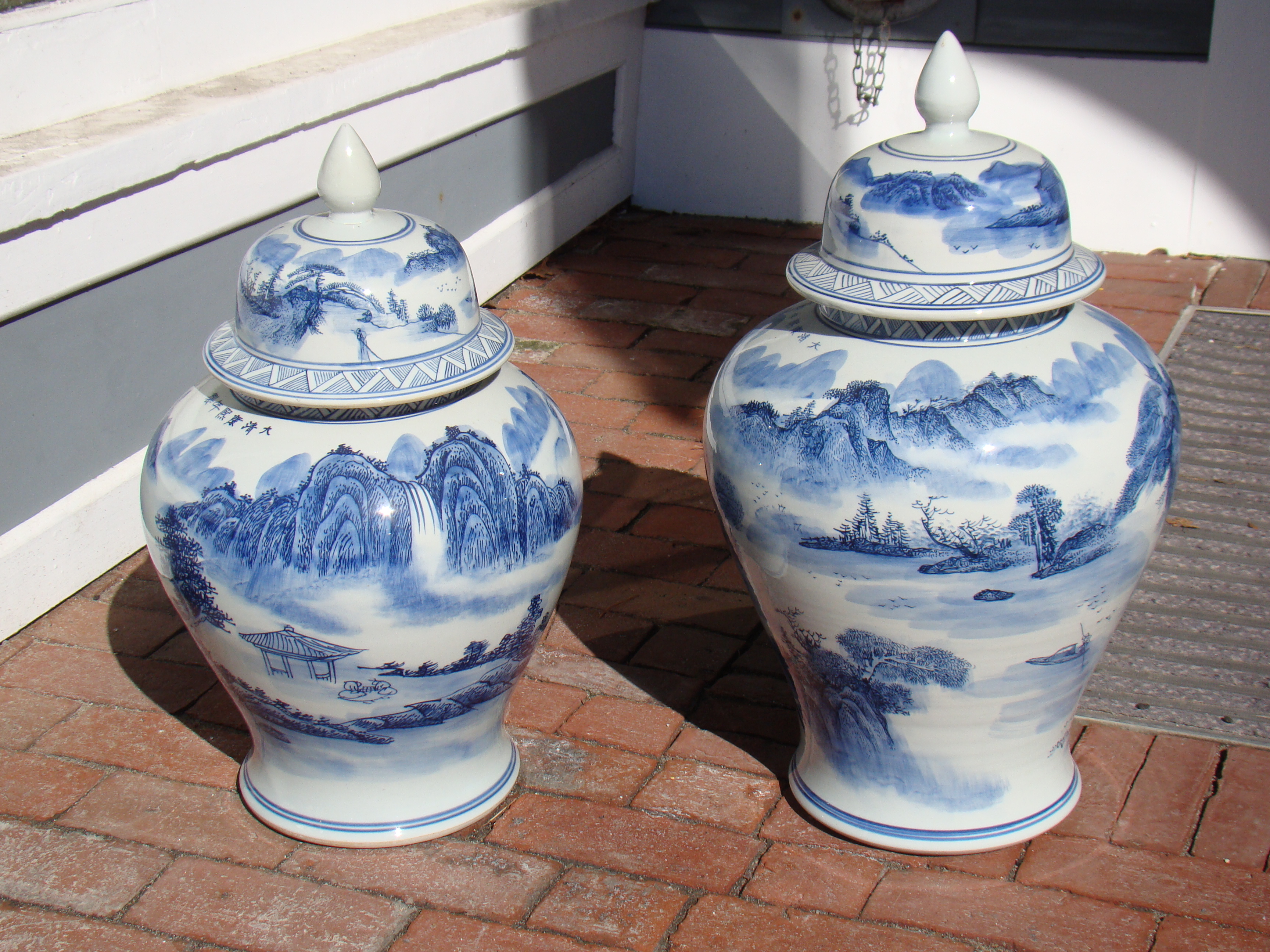 Two nearly identical Chinese covered jars priced separately