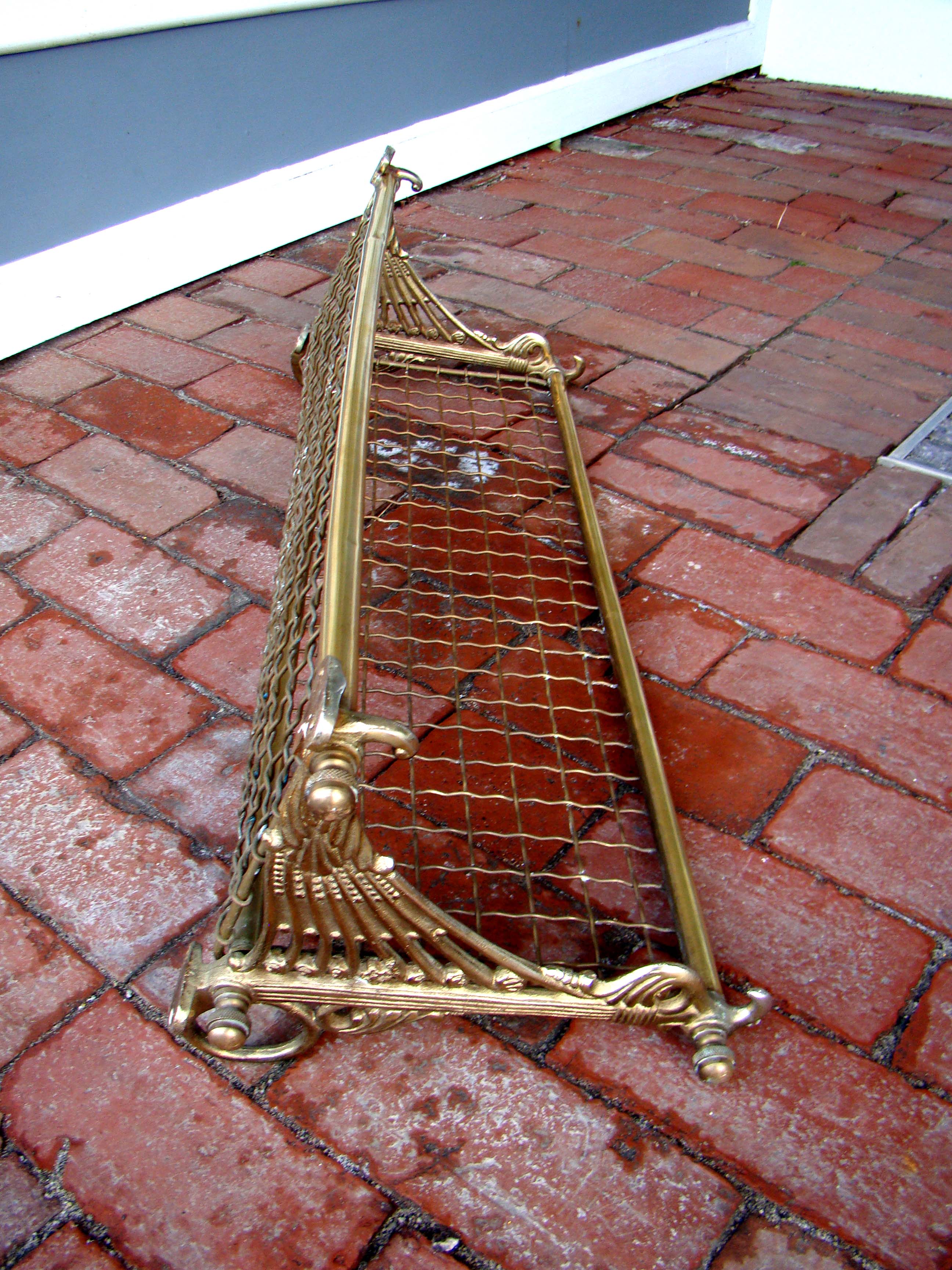 An attractive vintage Art Nouveau period brass hat rack used in a railroad car circa 1890
