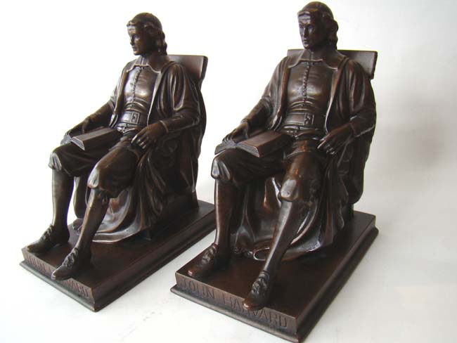 An extremely fine pair of John Harvard bookends circa 1930