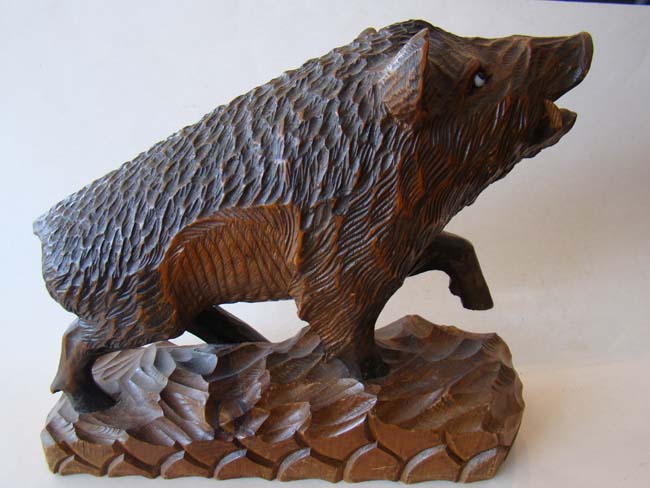 A charming vintage "Black Forest" style carved wild boar made in Germany circa 1900