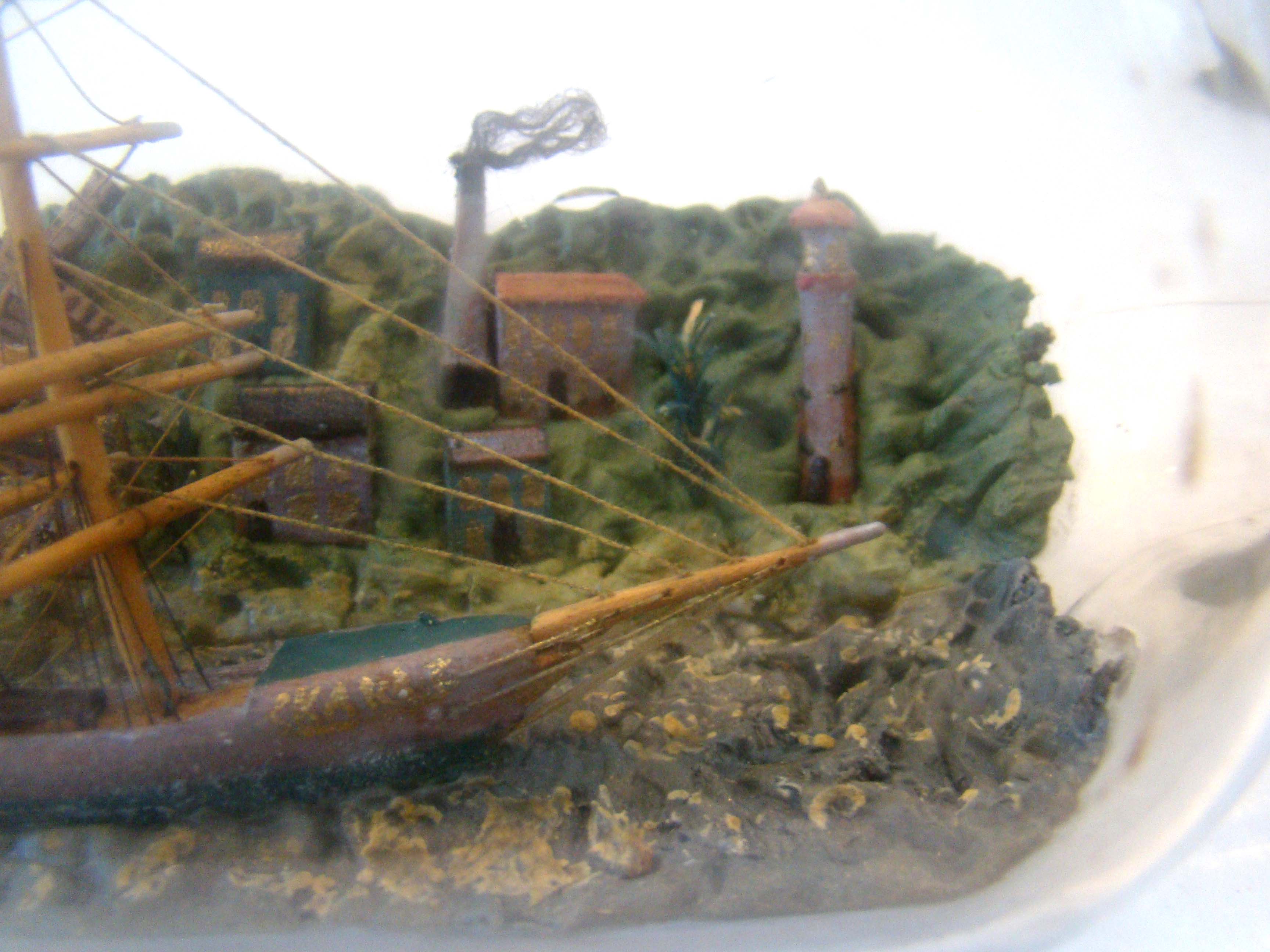 A wonderful vintage ship-in-a bottle circa 1890-1910 with elaborate and detailed village in the background. — image 4