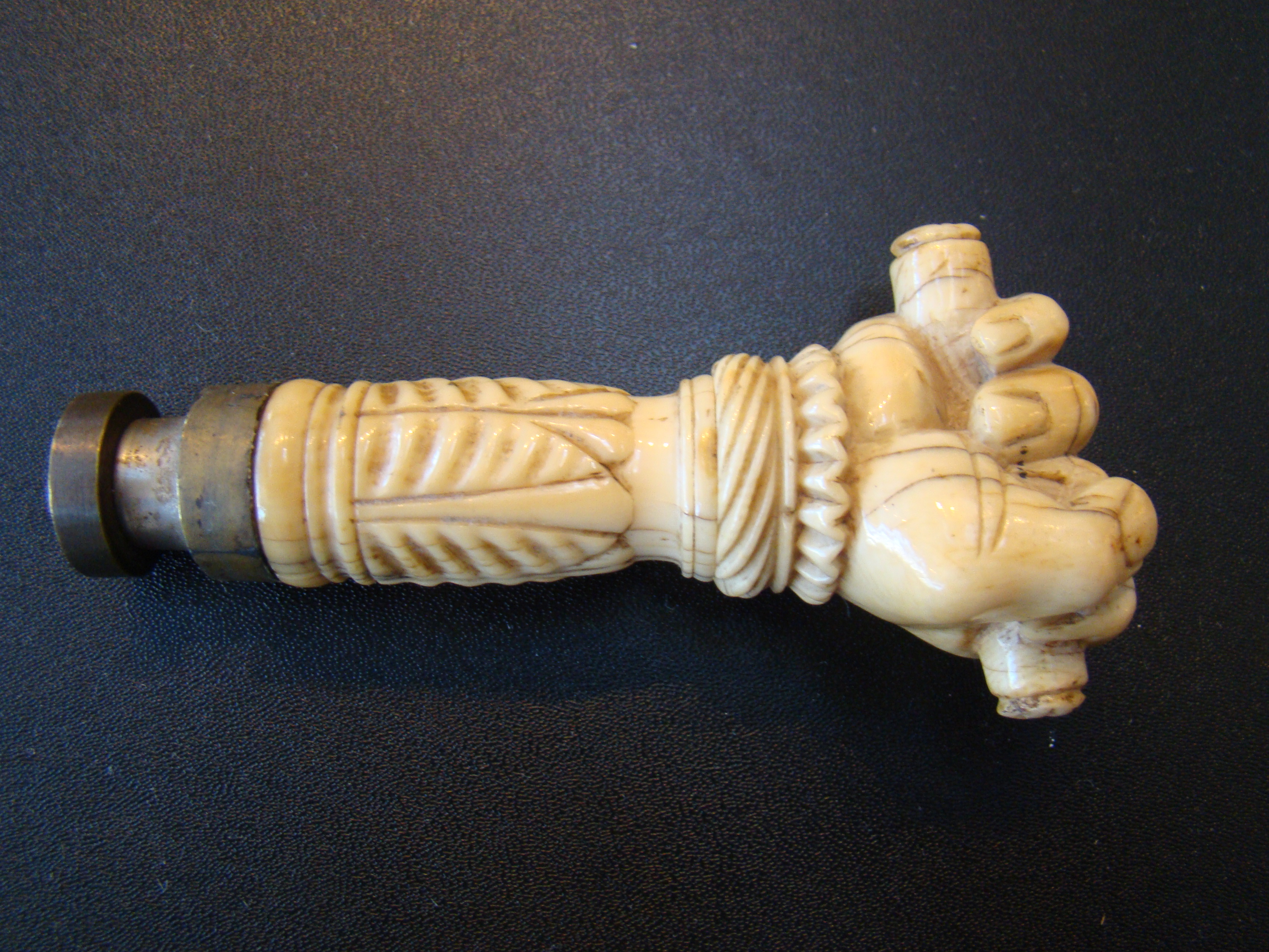 A fine and RARE 19th century sailor carved whale ivory desk seal in the form of a clenched fist — image 3