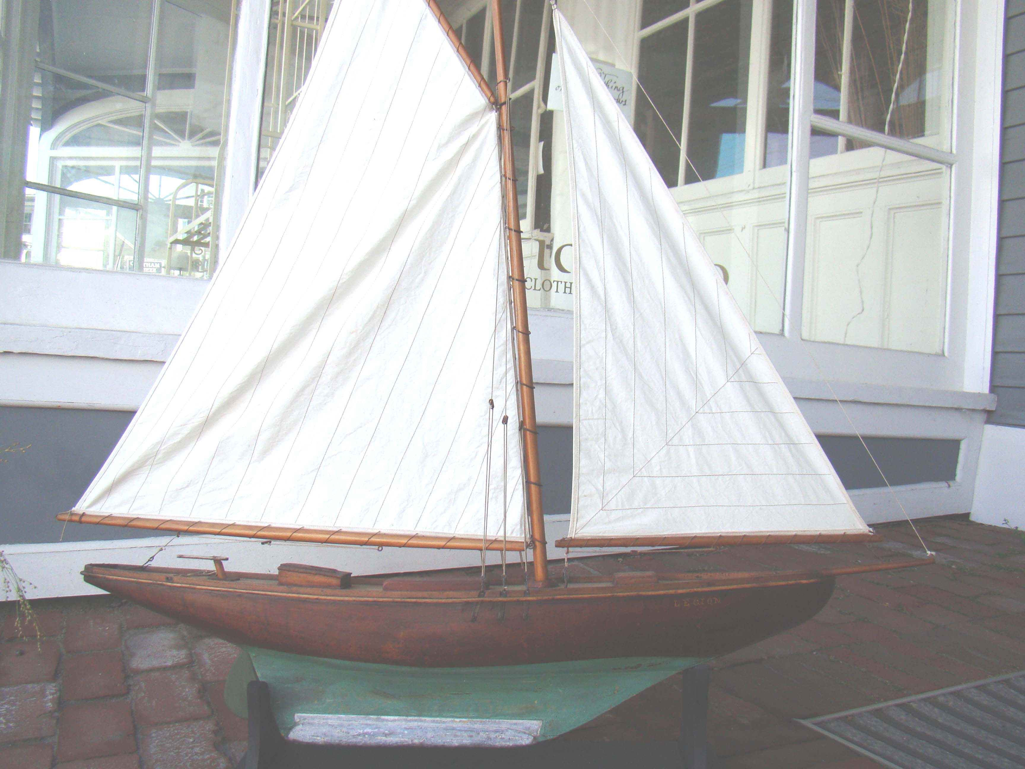 A vintage Pond Boat with the name "Legion" circa 1910