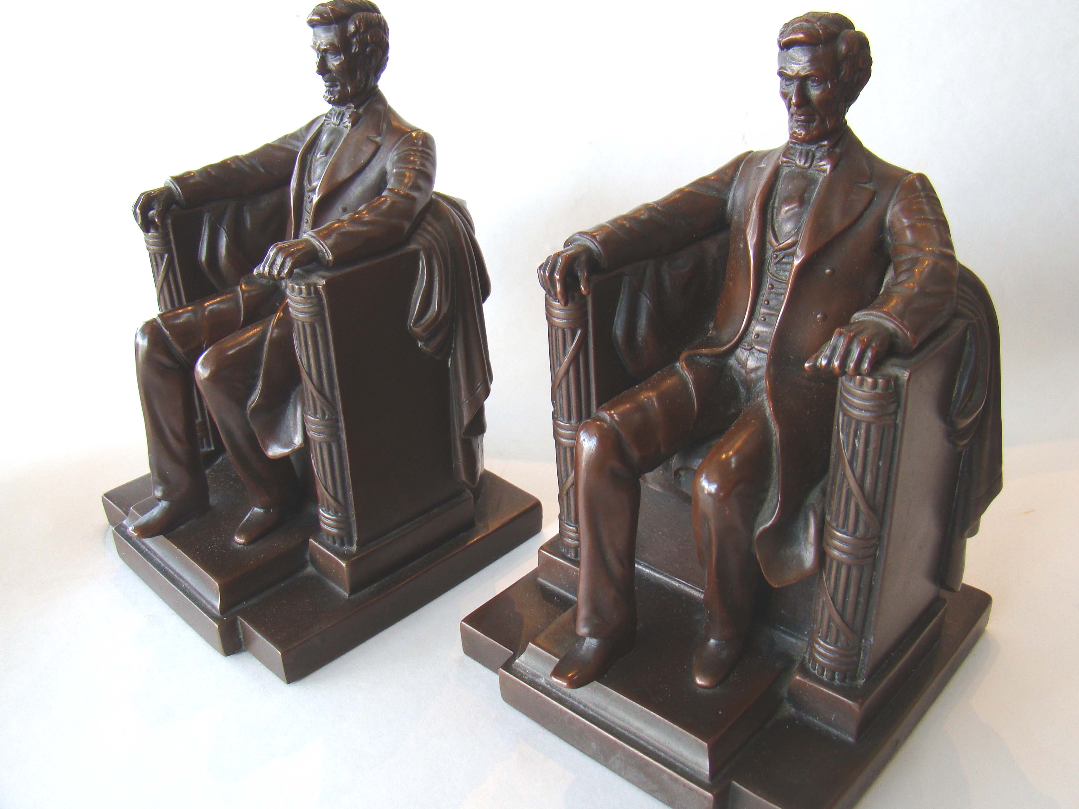 A fabulous pair of chocolate brown bronze finished "LINCOLN in the chair" bookends by Jennings Brothers circa 1925  — image 2