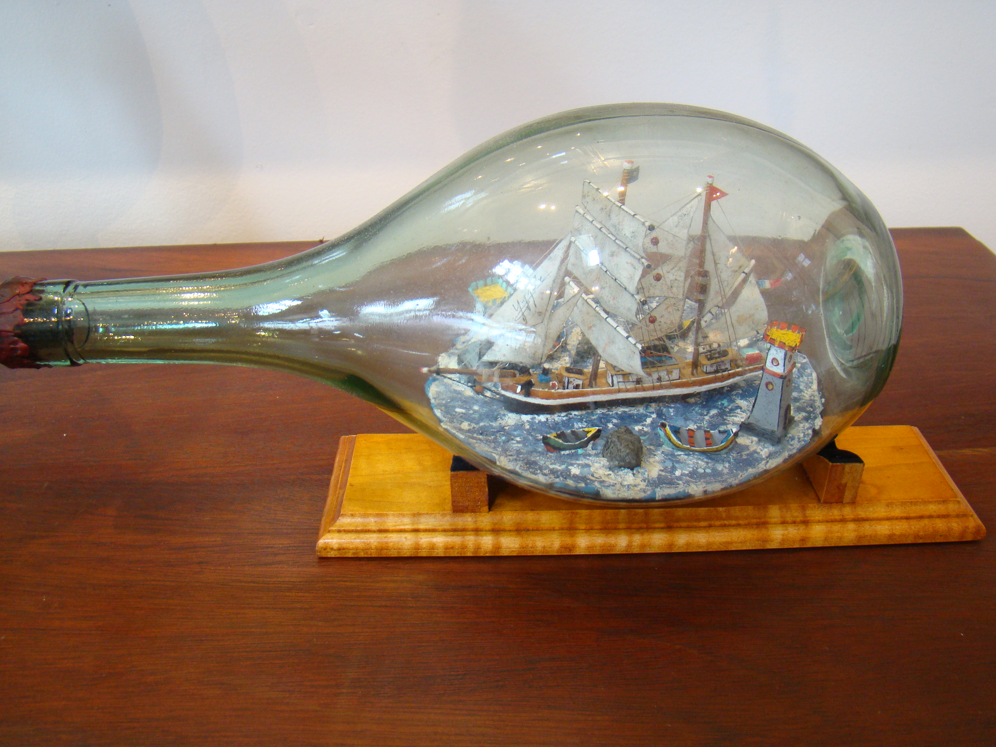 An attractive and well detailed vintage ship-in a bottle of Mediterranean style circa 1940-1950
