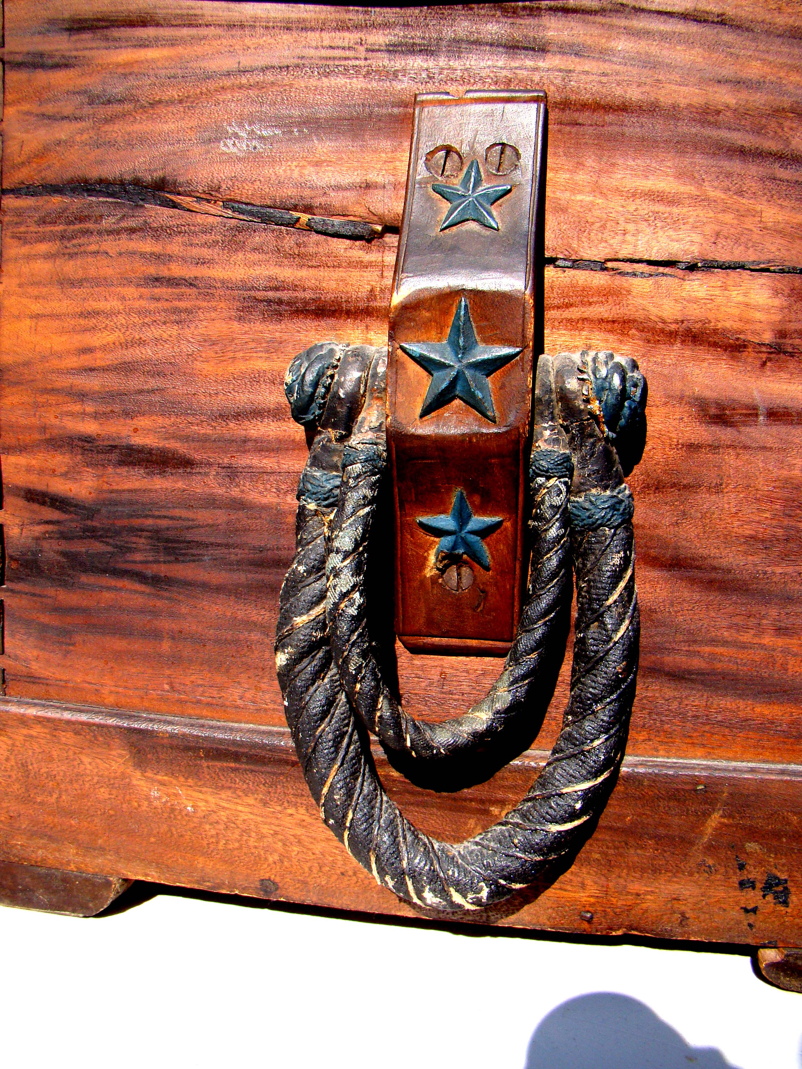 A wonderful early 19th century camphorwood sea chest with cleats carved with blue stars and double ropework beckets circa 1820 — image 3