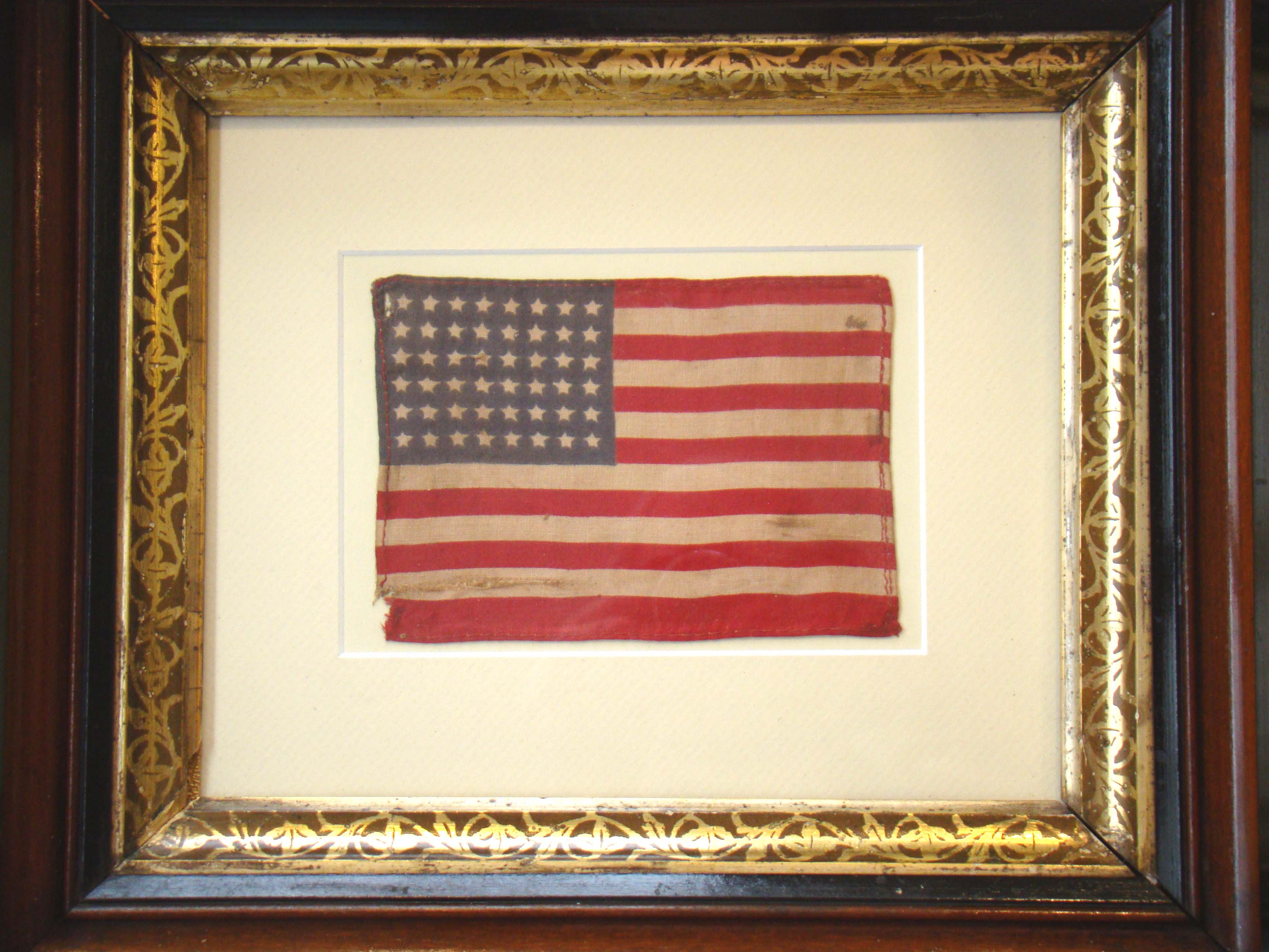 A  nicely framed and matted vintage 48 star parade flag circa 1912