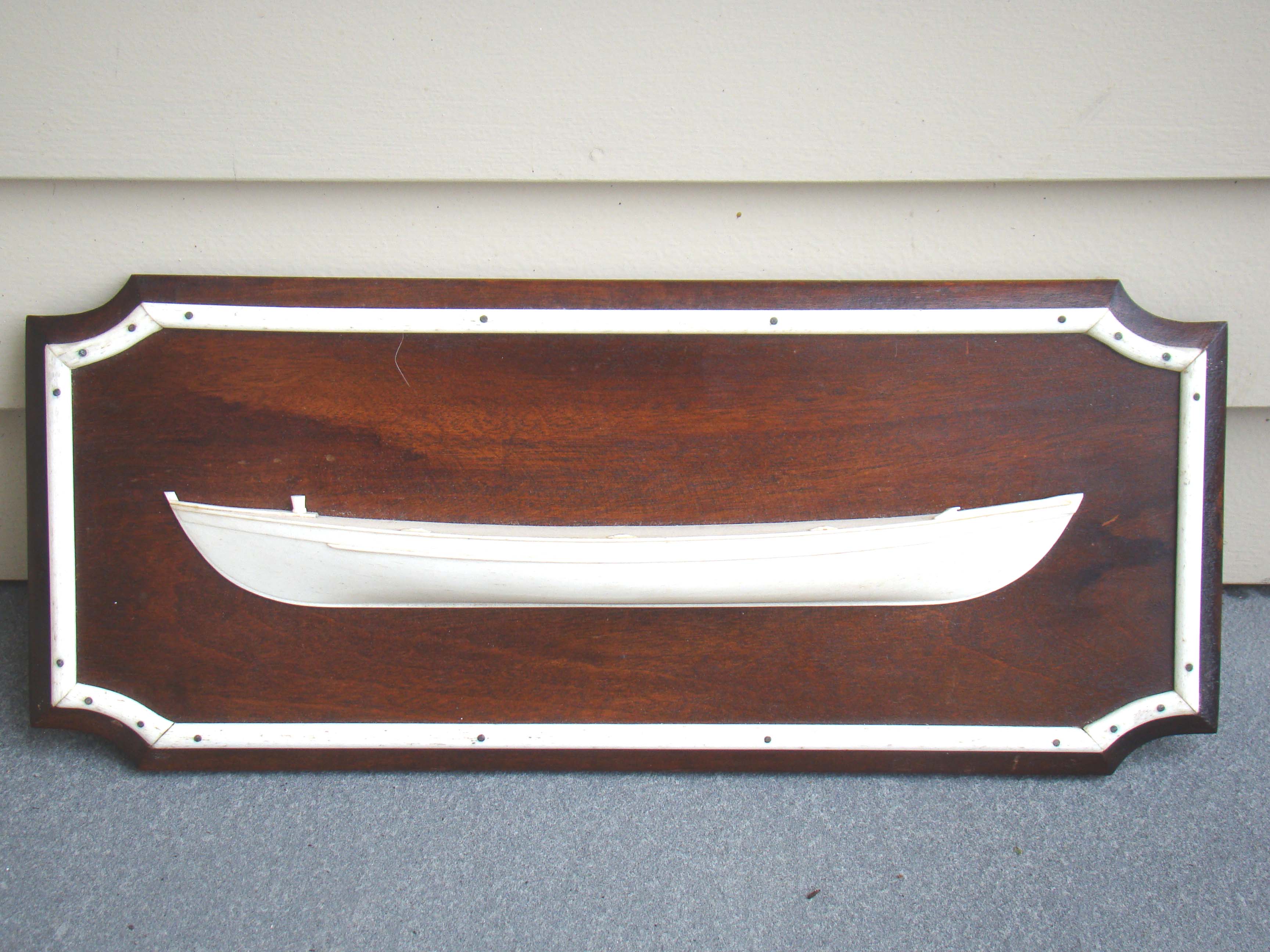 A beautiful whale bone half hull model of a whale boat by Aletha Macy of Nantucket 1965