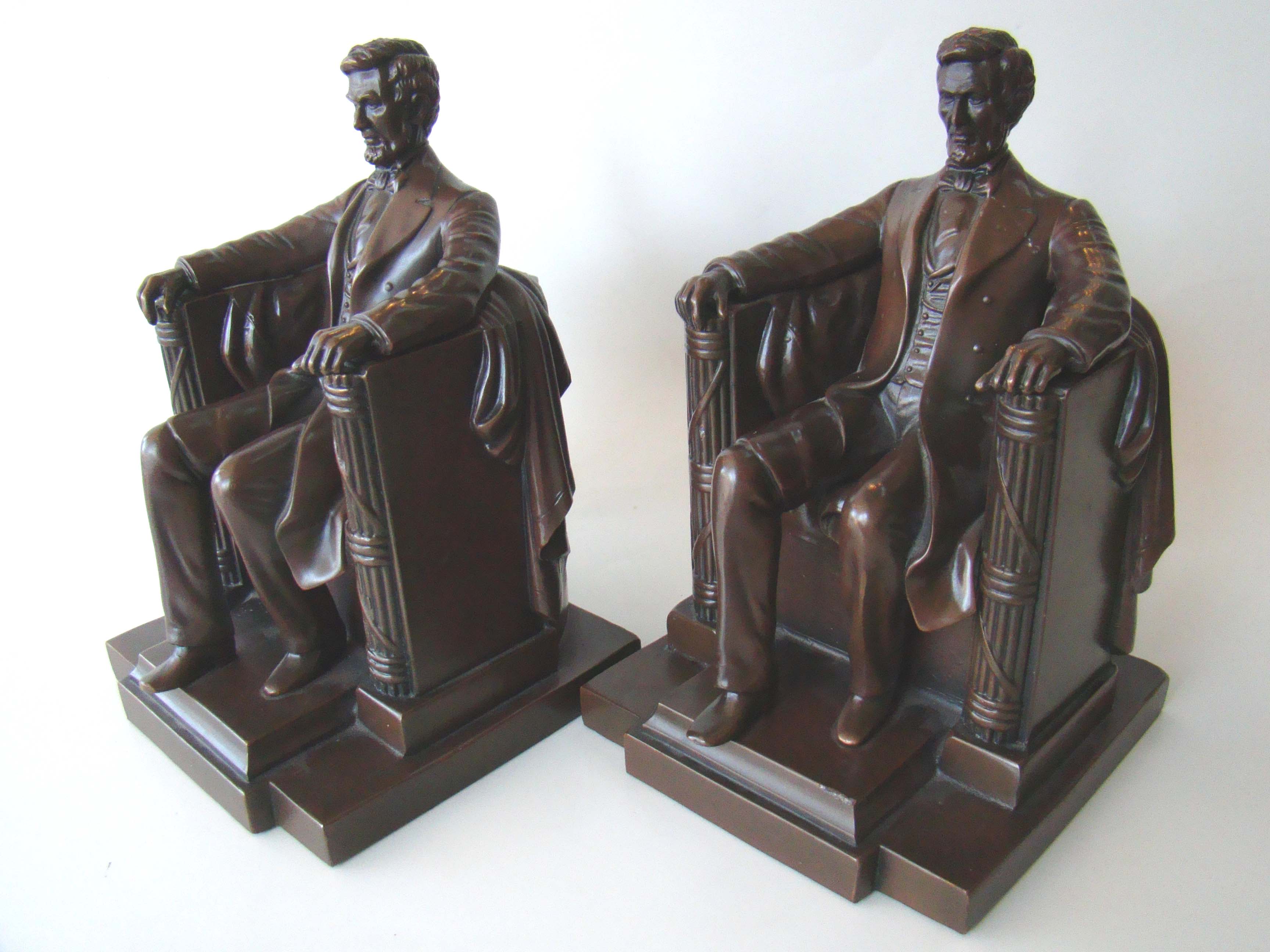 A fabulous pair of vintage "Lincoln in the chair" bookends made by Jennings Brothers circa 1925