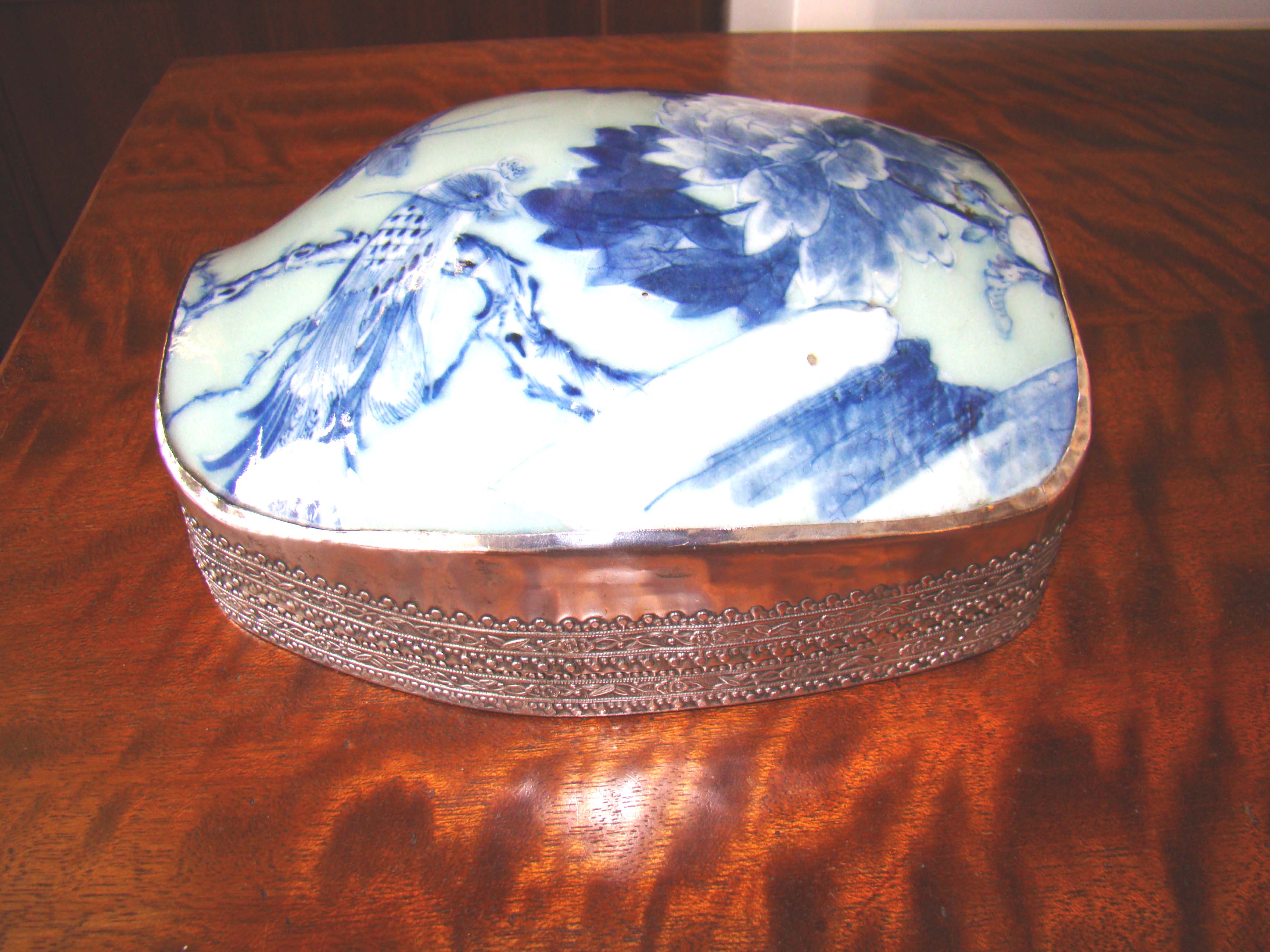A gorgeous antique Chinese Ming or Ching Dynasty silver mounted porcelain box