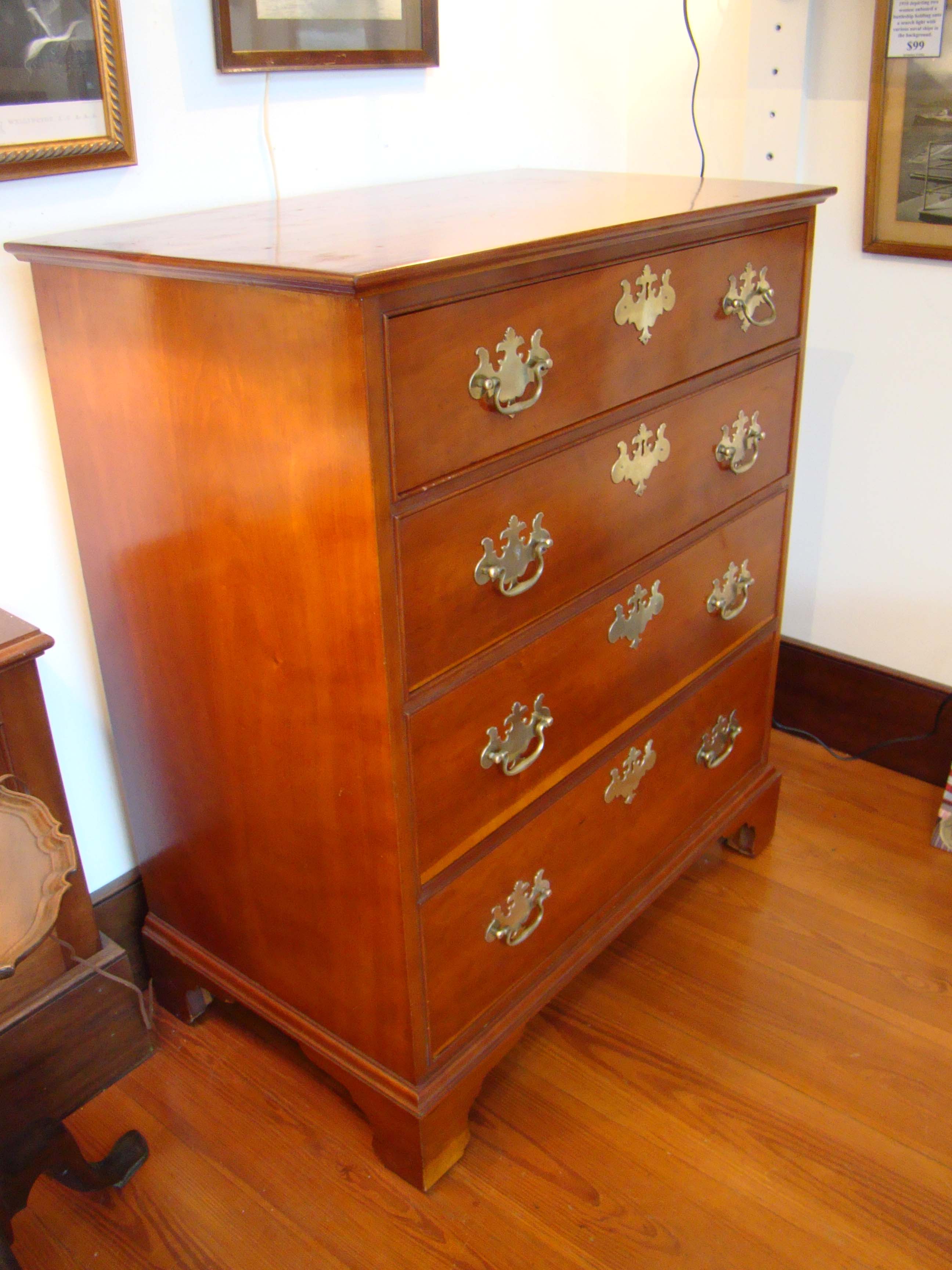 A fine New England cherry four drawer bureau made circa 1876