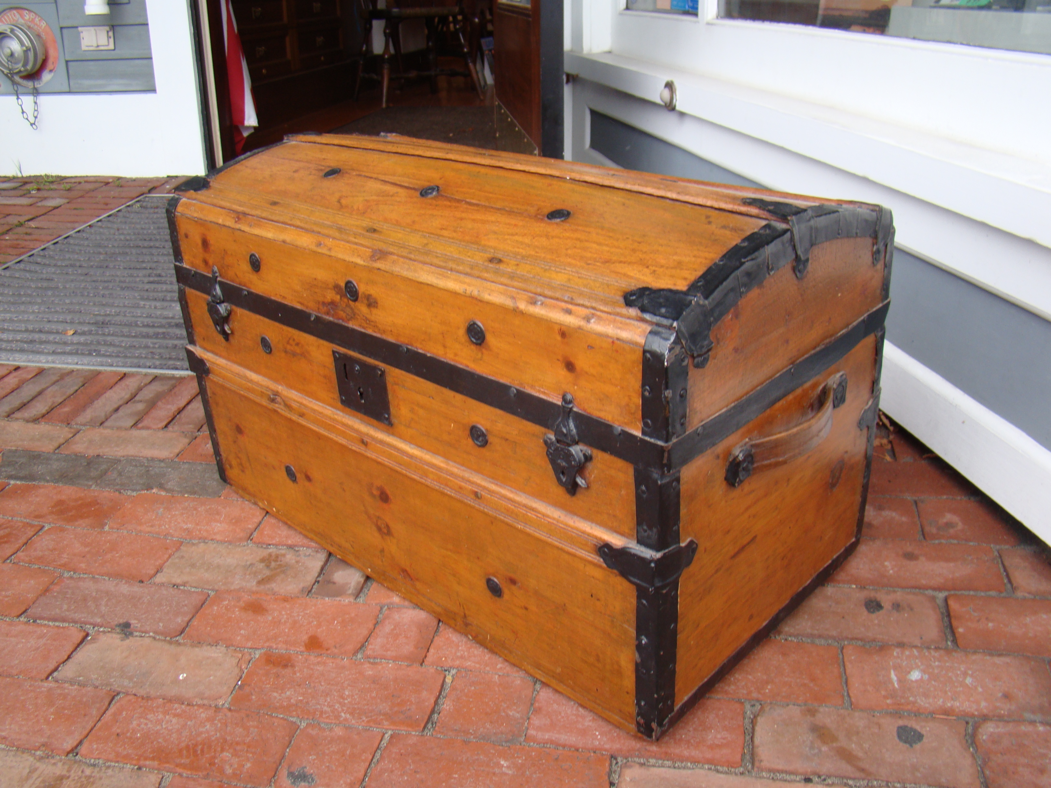 A good 19th century dome top traveling trunk circa 1875