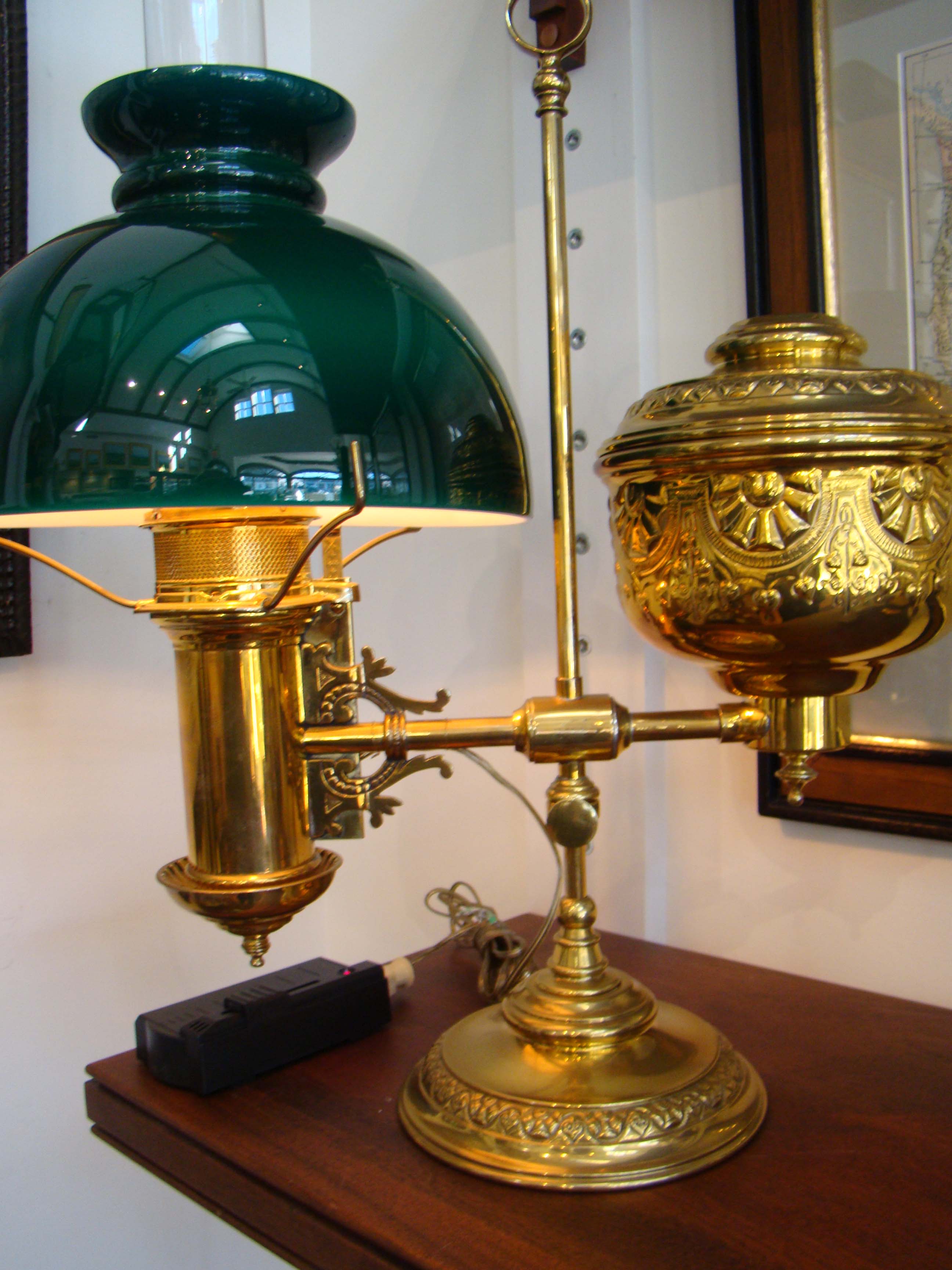 A FABULOUS MUSEUM QUALITY ebossed and cast brass Student Lamp made by the Rochester Lamp Company of New York circa 1884