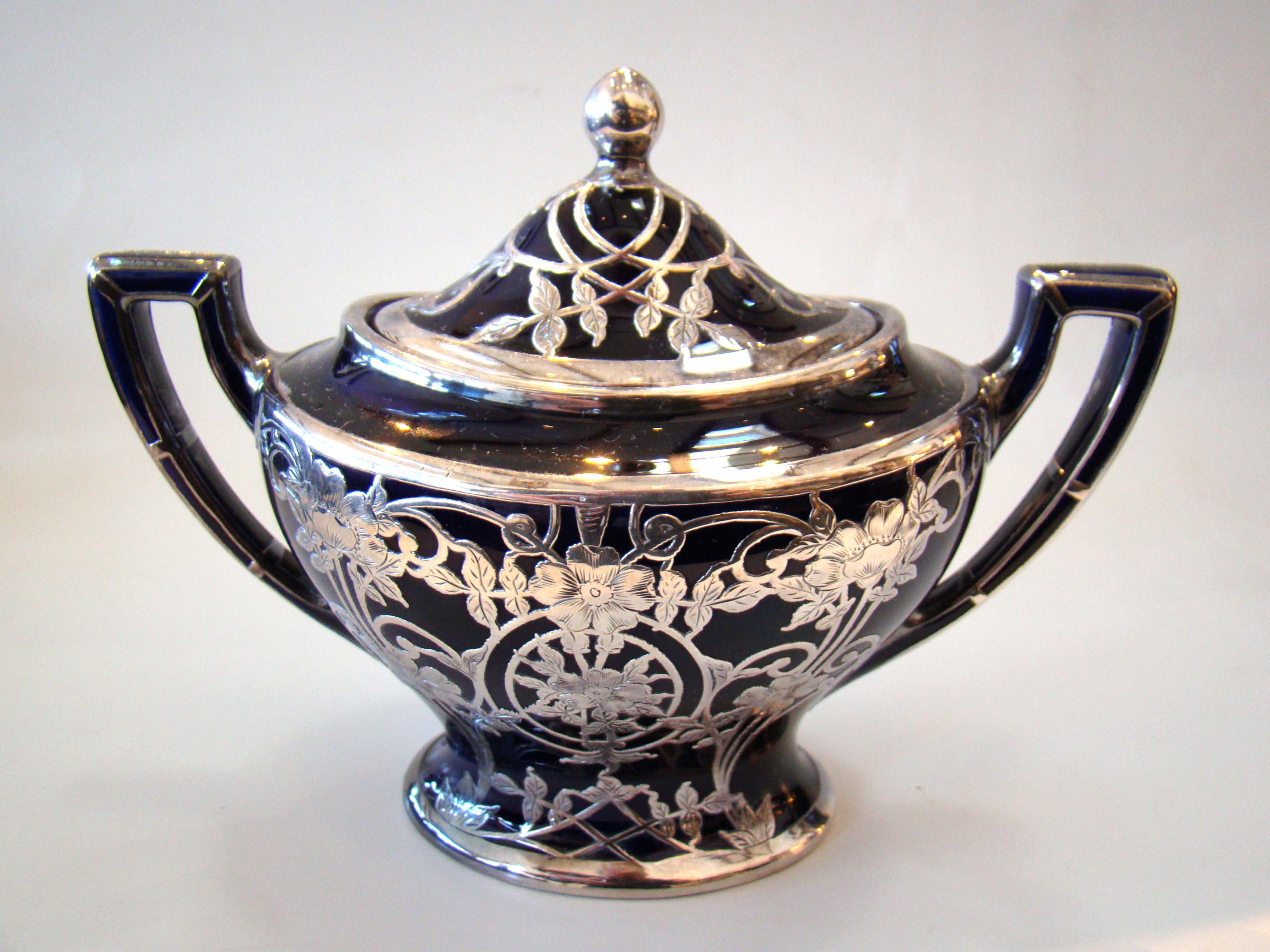 A stunning four-piece tea & coffee service in cobalt blue porcelain with silver overlay made by Lenox circa 1910 — image 4