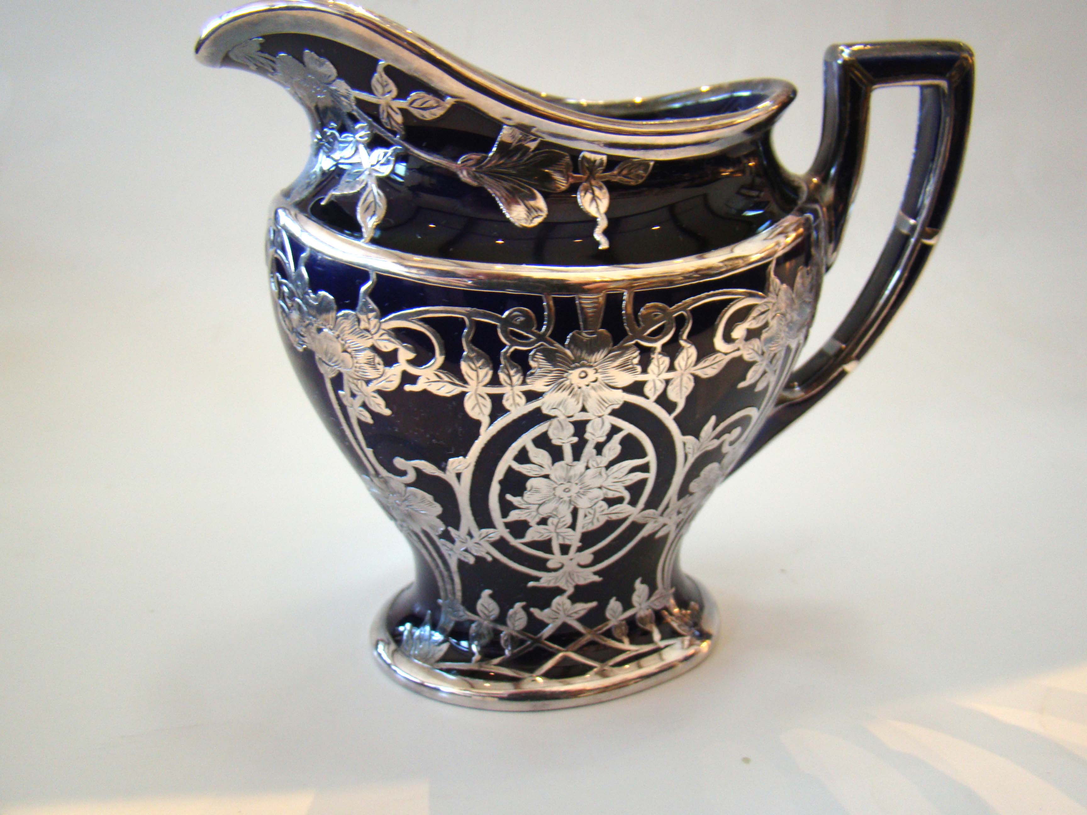 A stunning four-piece tea & coffee service in cobalt blue porcelain with silver overlay made by Lenox circa 1910 — image 5