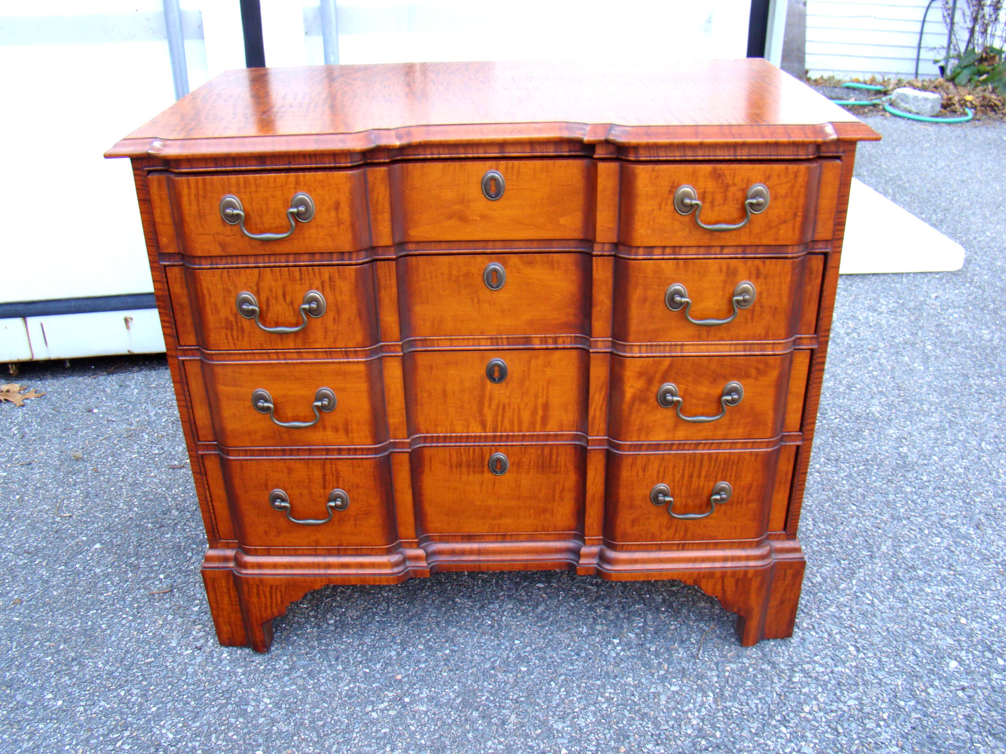 A fine 18th century 'style' tiger maple Block-Front chest made by Eldred Wheeler