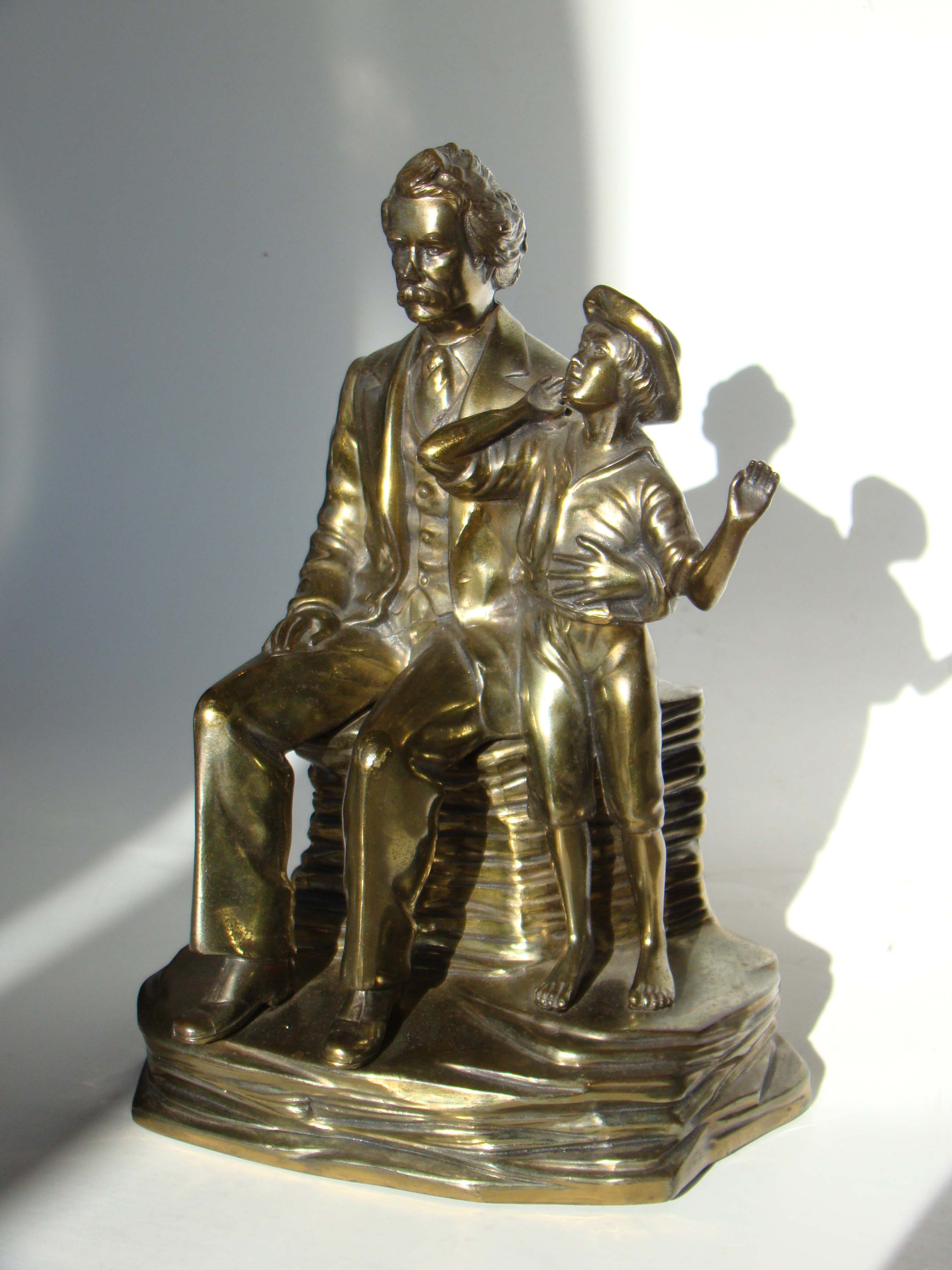 A fine and rare pair of vintage Mark Twain & Tom Sawyer bookends made by Jennings Brothers circa 1935-1940 — image 2