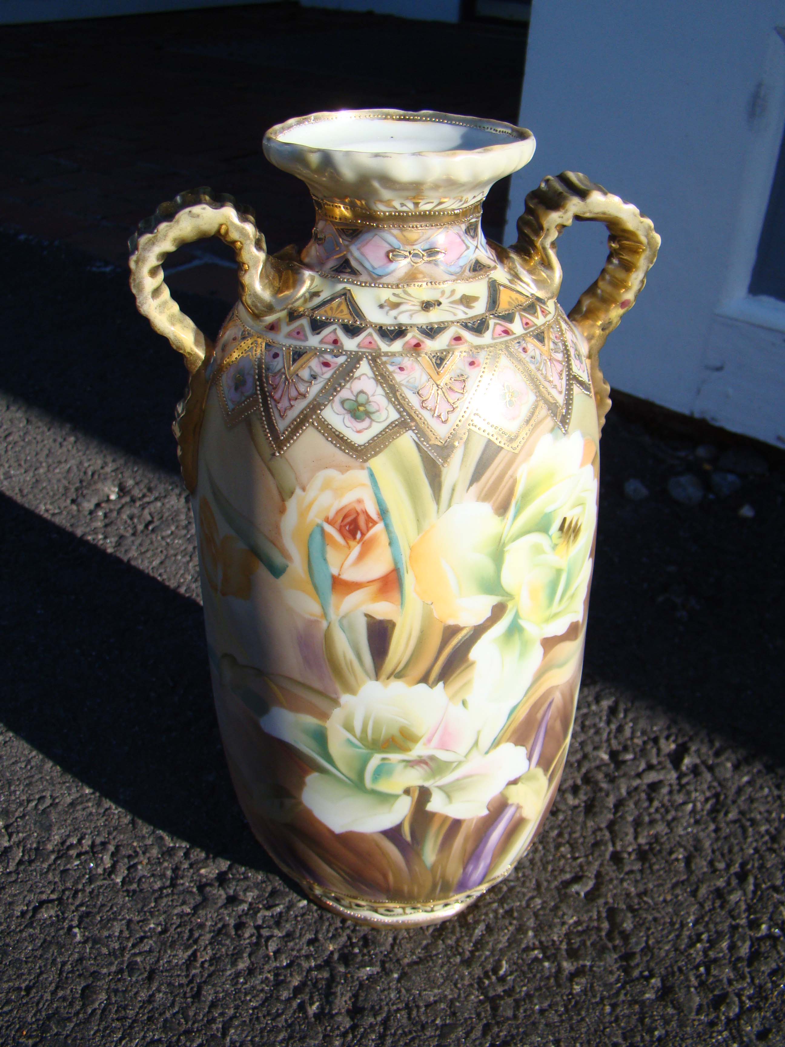 A magnificent hand painted Nippon two-handled vase circa 1910