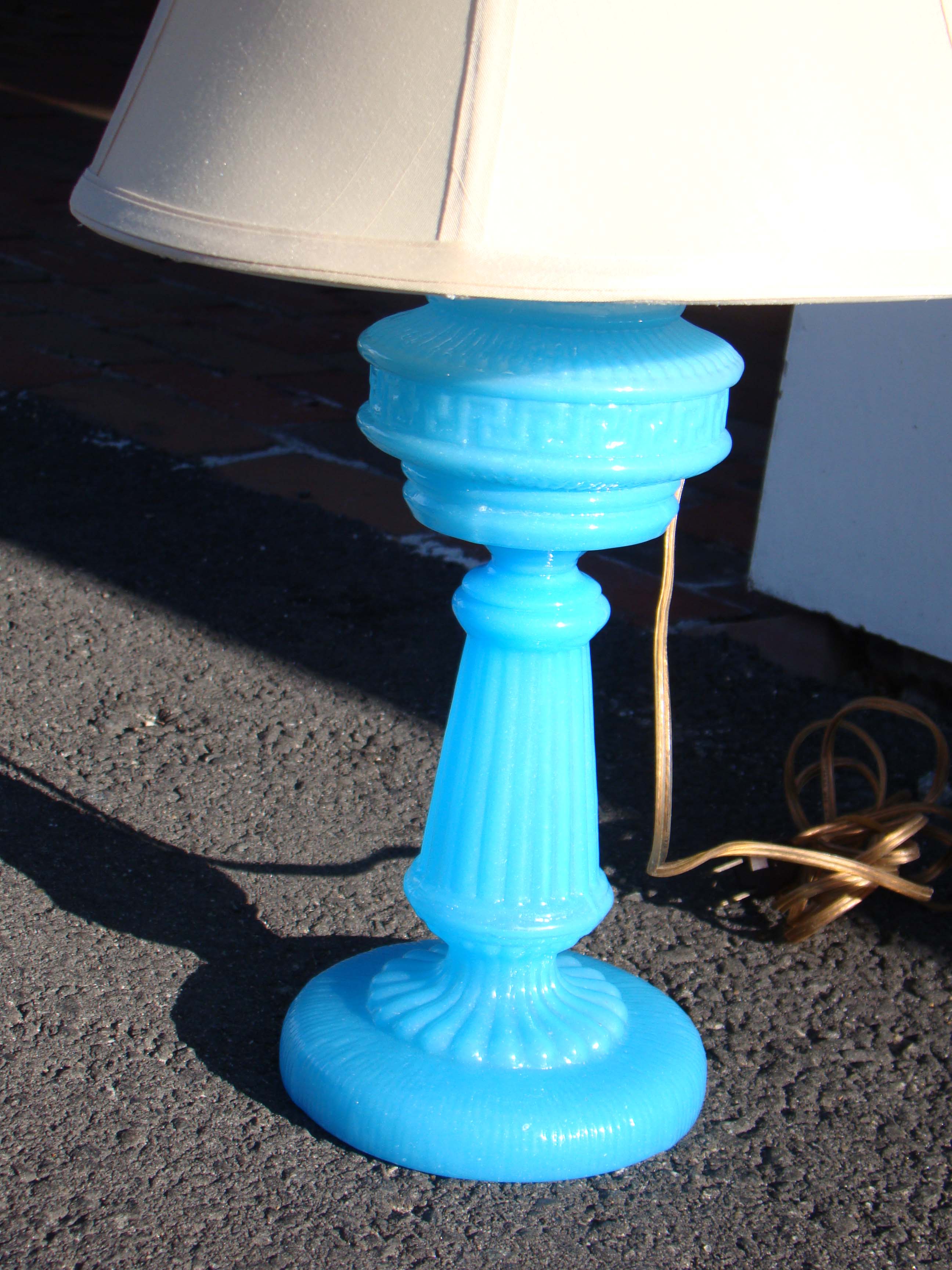 A fine late 19th century aqua blue glass oil lamp