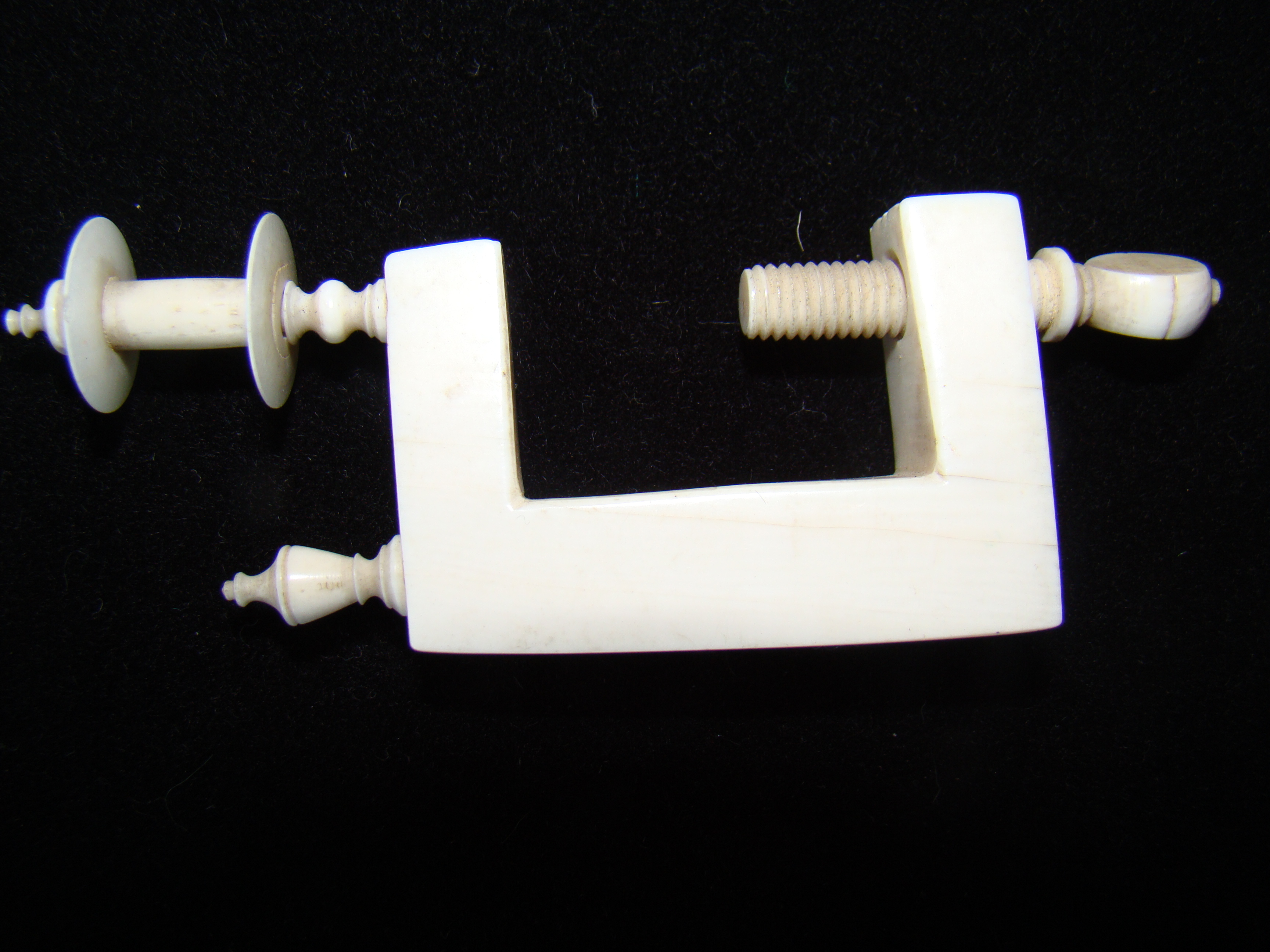 A 19th century whale ivory sewing bird clamp circa 1840