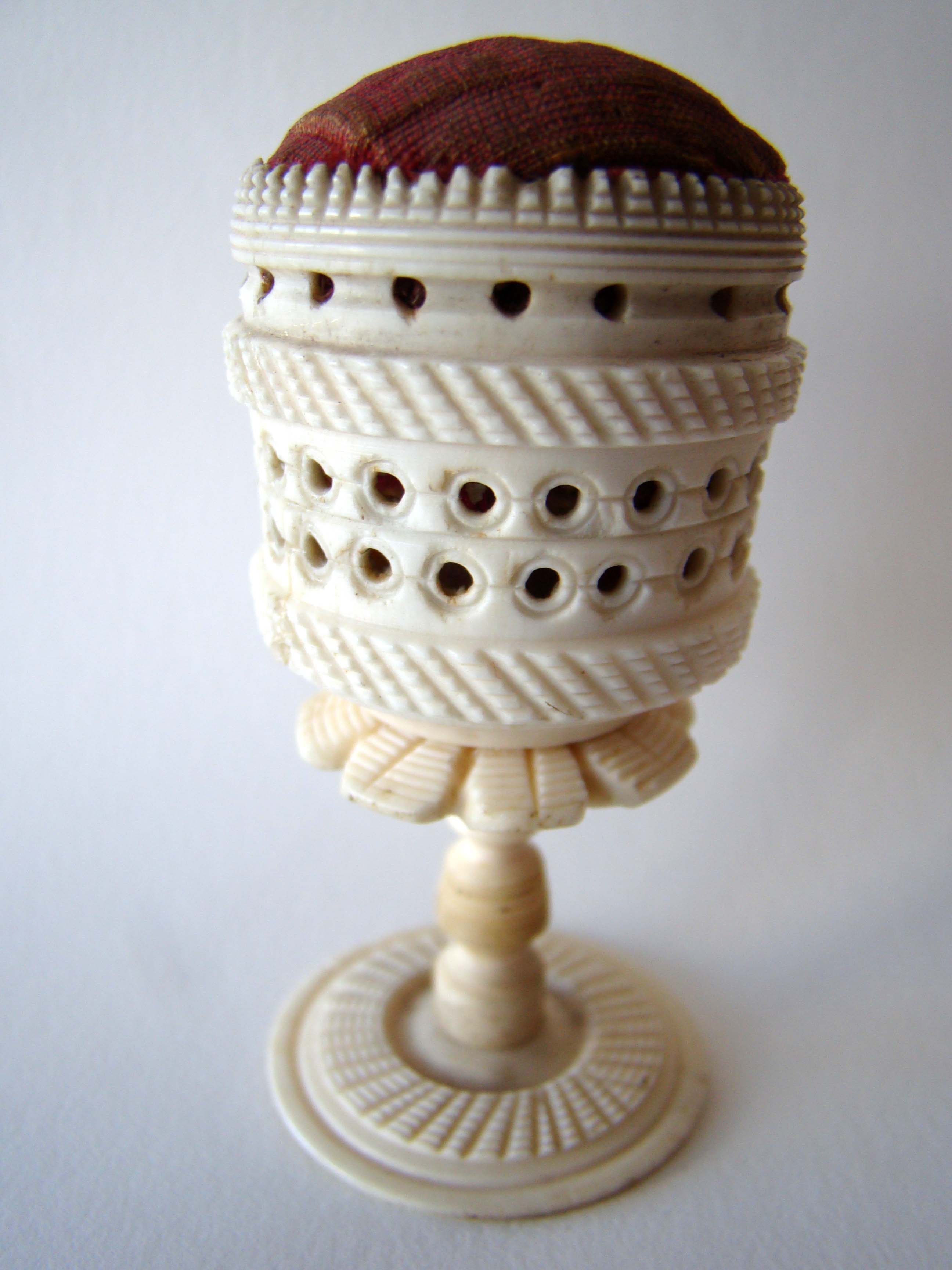 A beautiful 19th century bone pin cushion on stand circa 1850