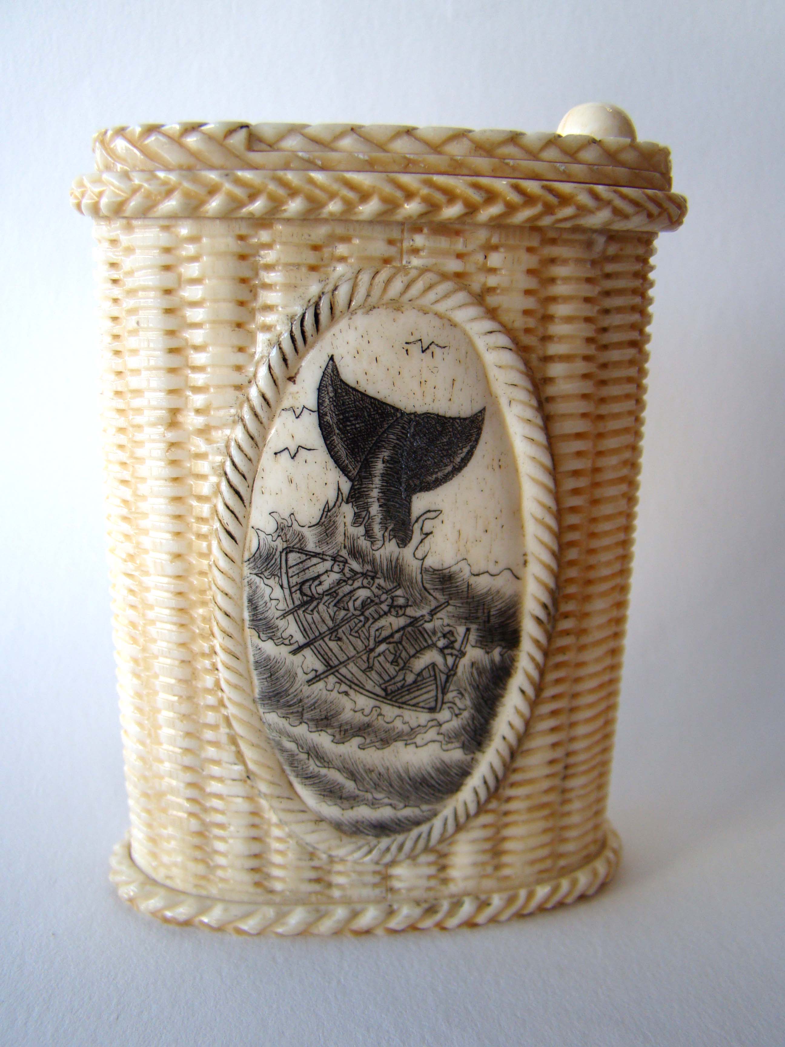 A beautiful basket weave bone box having whaling scenes on the front, back and top. 20th century