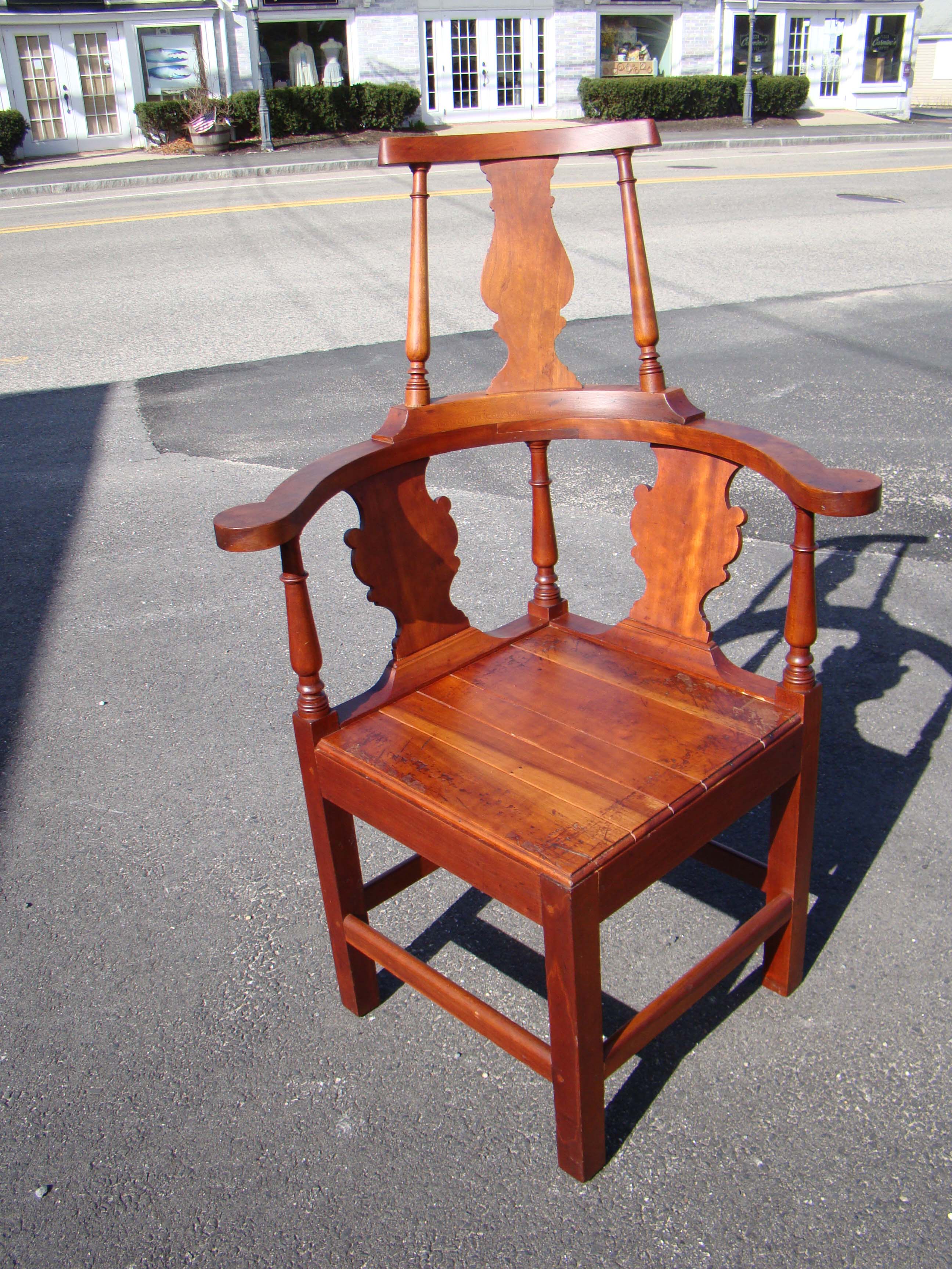 A beautiful 19th century cherry wood Queen Anne style comb-back corner chair