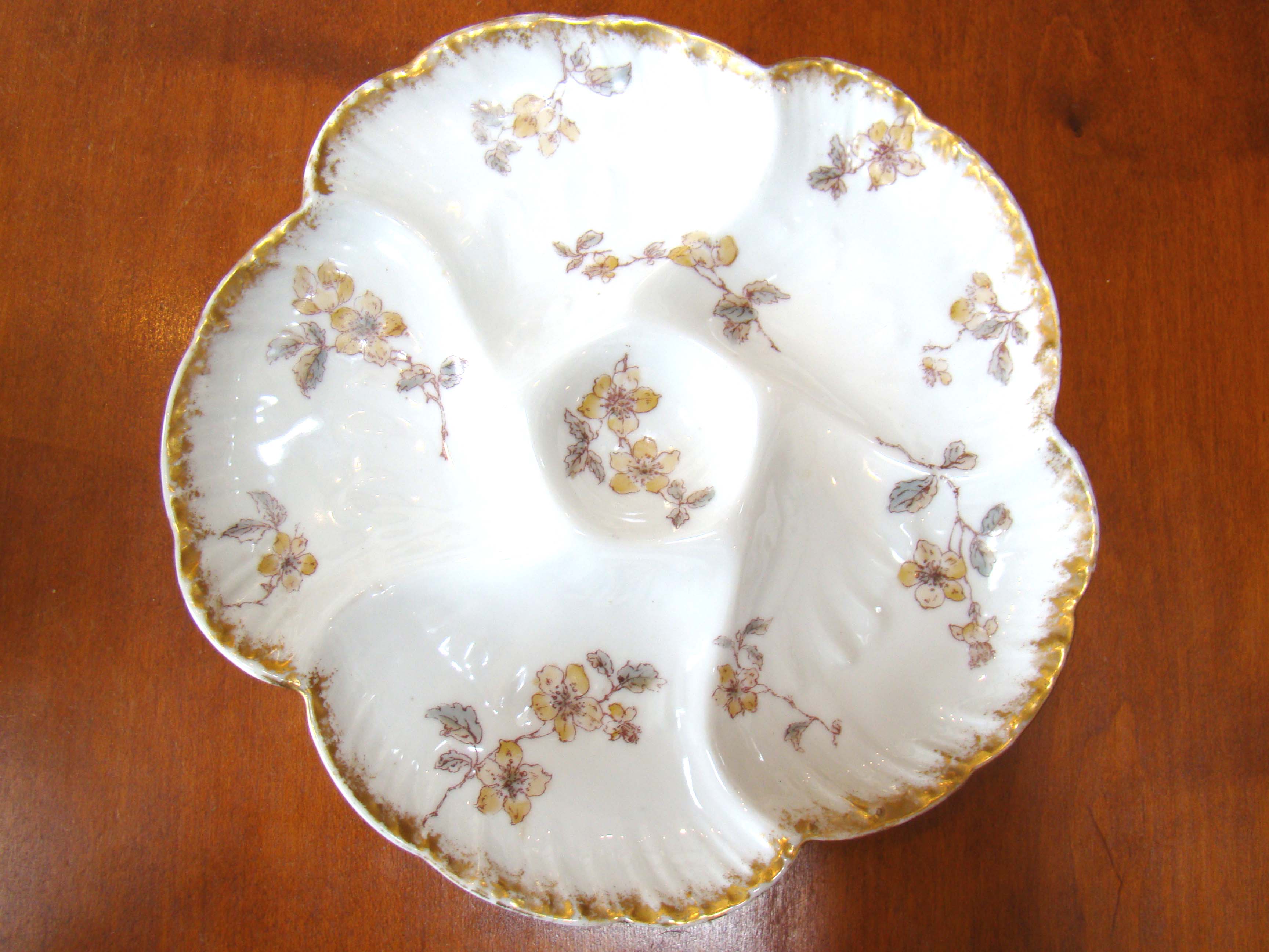 A fine Limoges oyster plate made in 1891 by Charles Field Haviland