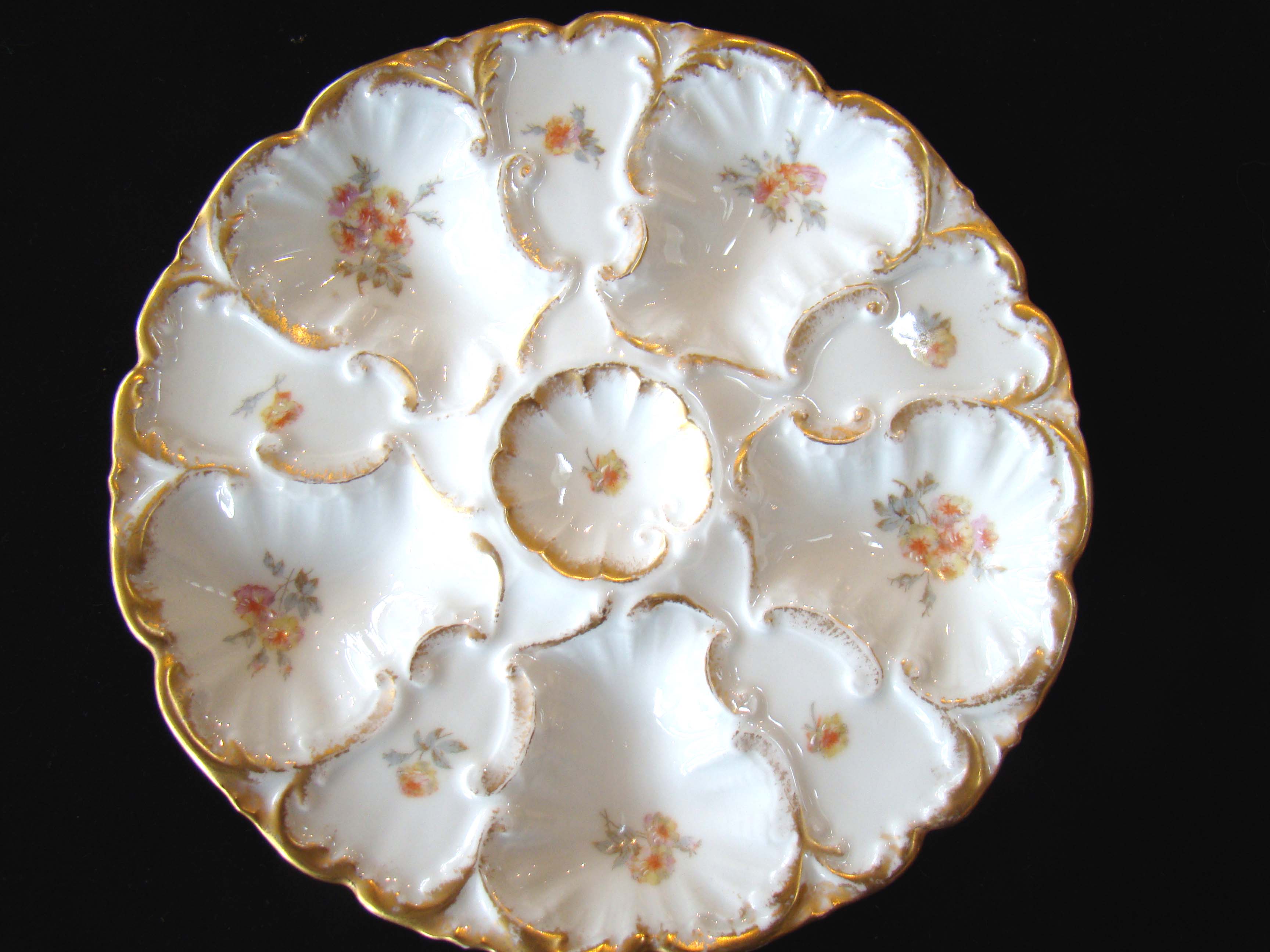 A fine late 19th century Limoges oyster plate circa 1885