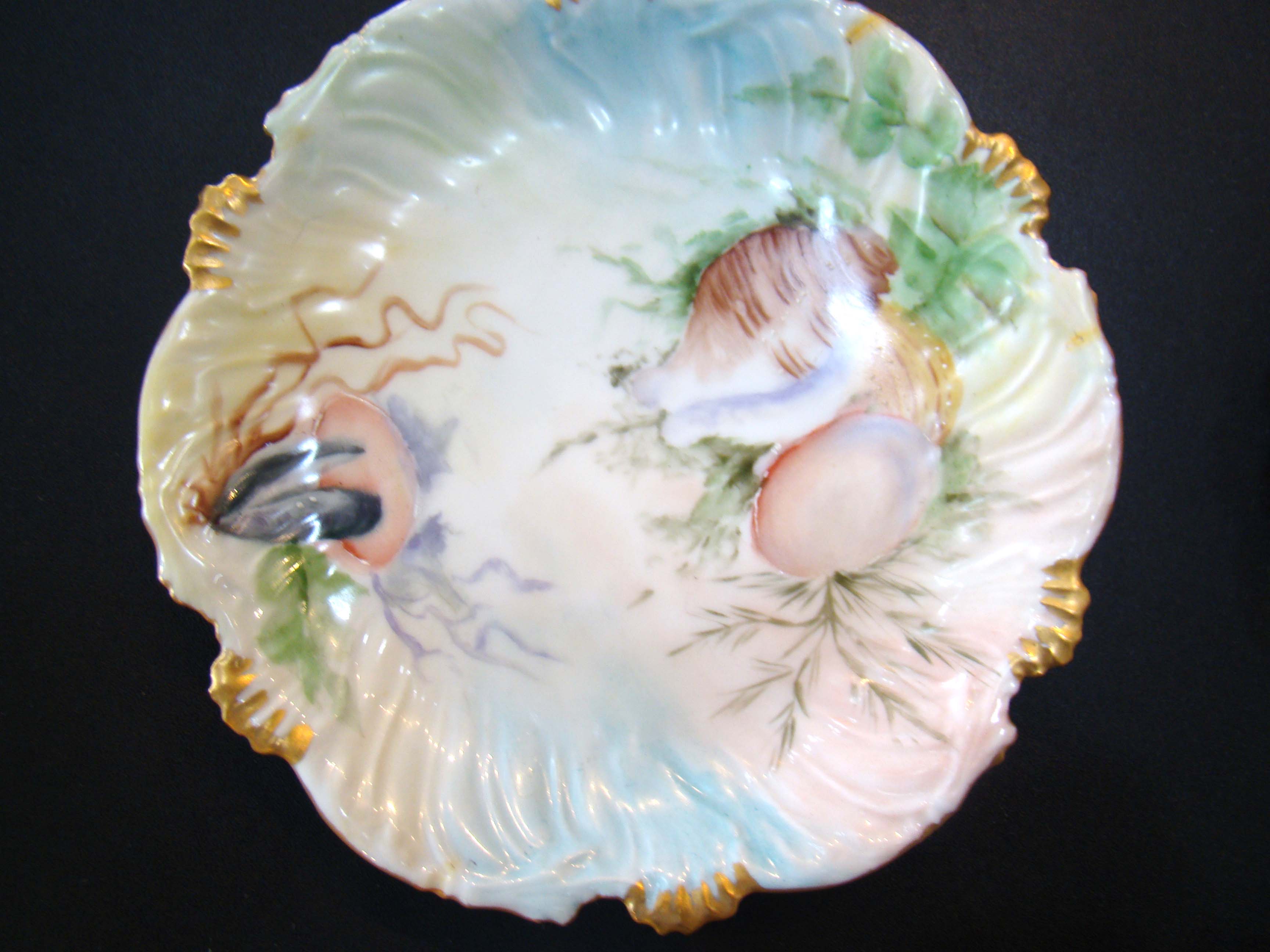 A set of six vintage hand painted seascape pattern Limoges side plates made by Tressemann & Vogt circa 1890 — image 2