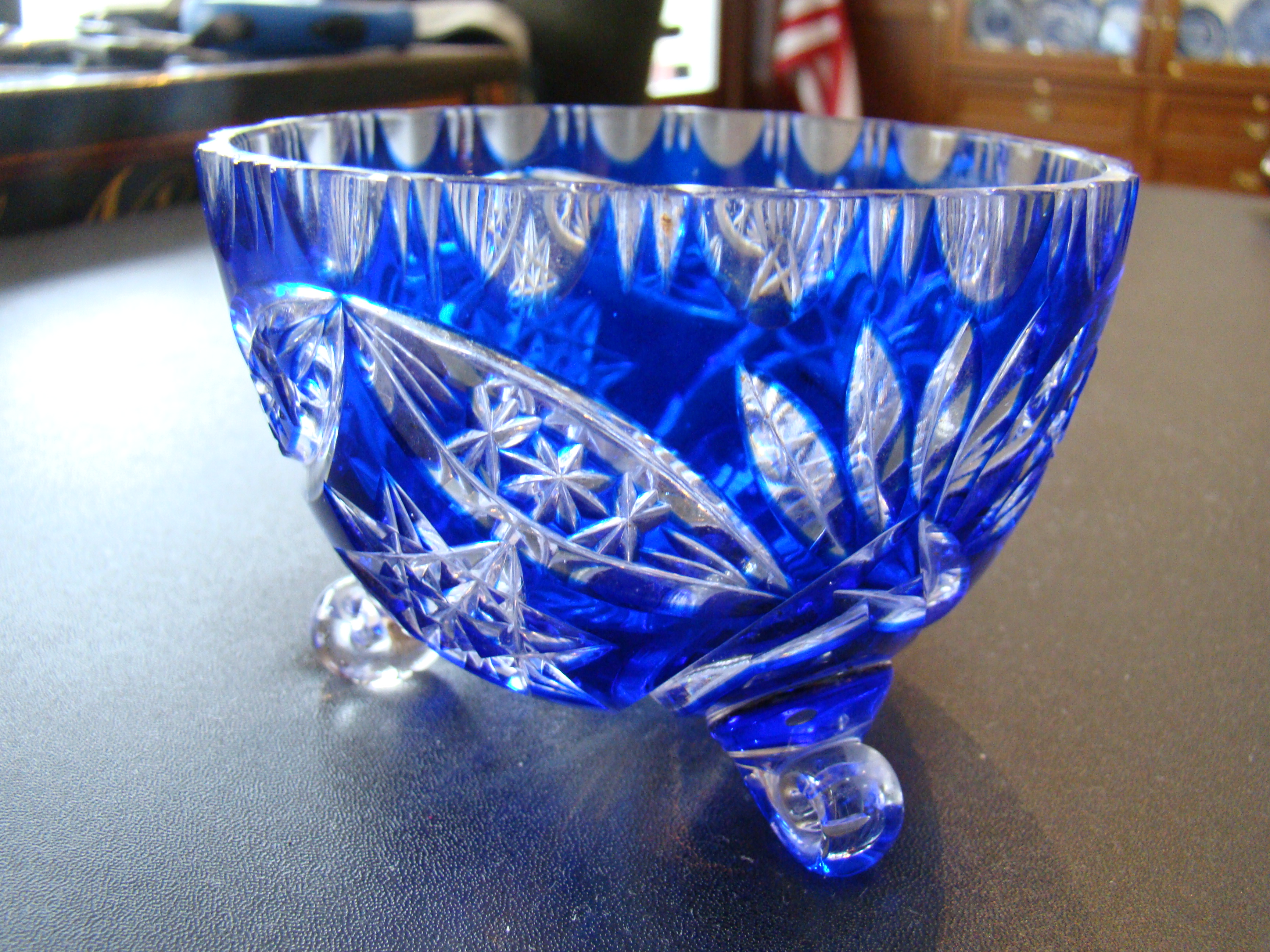 A beautiful small vintage cobalt blue cut crystal footed bowl