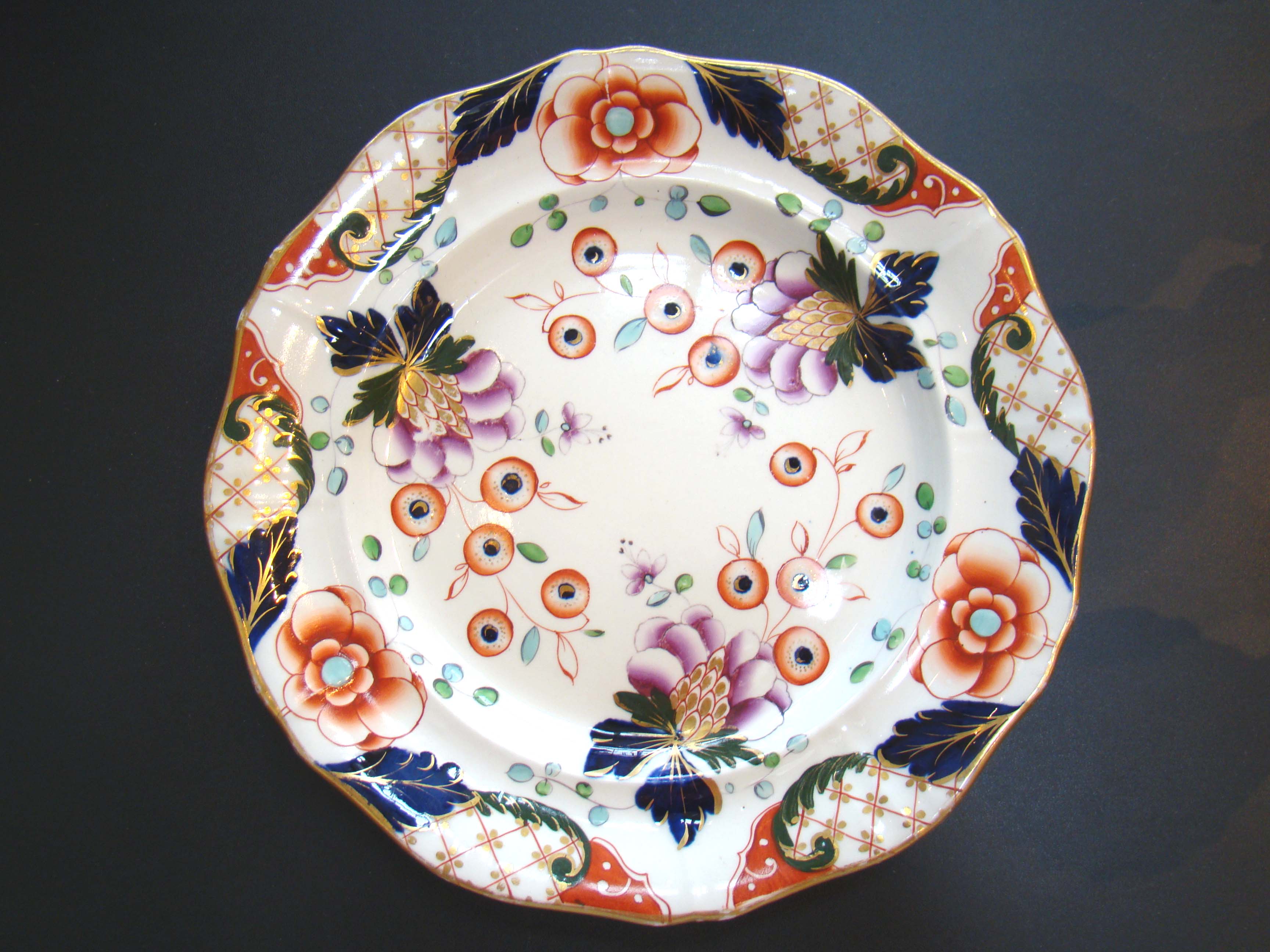 A rare set of eight early 19th century Ironstone dinner plates made by Davenport of Staffordshire circa 1815