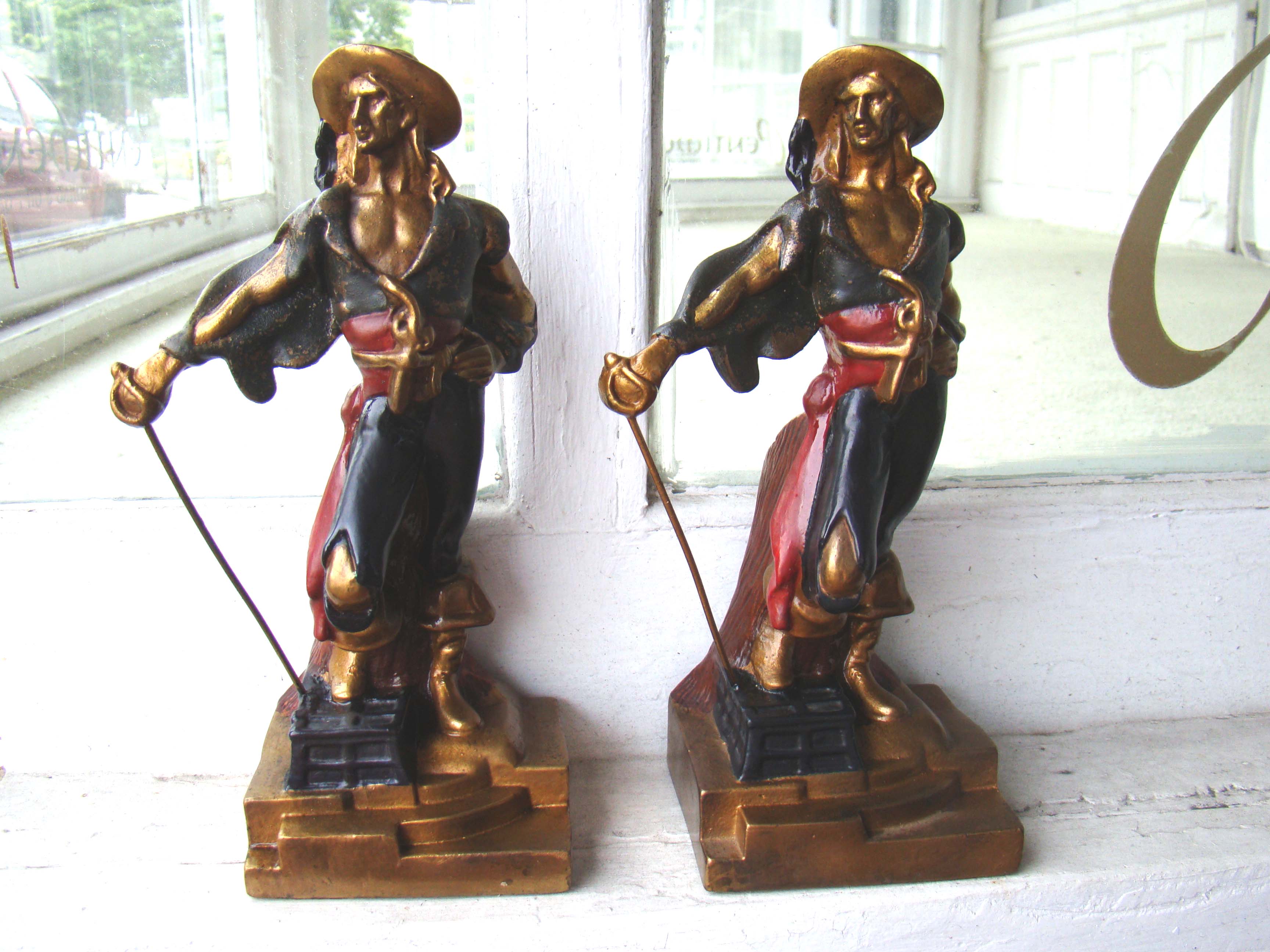 A fine pair of 10 1/2" Swashbuckler Pirate bookends made by the Armor Bronze Company circa 1928