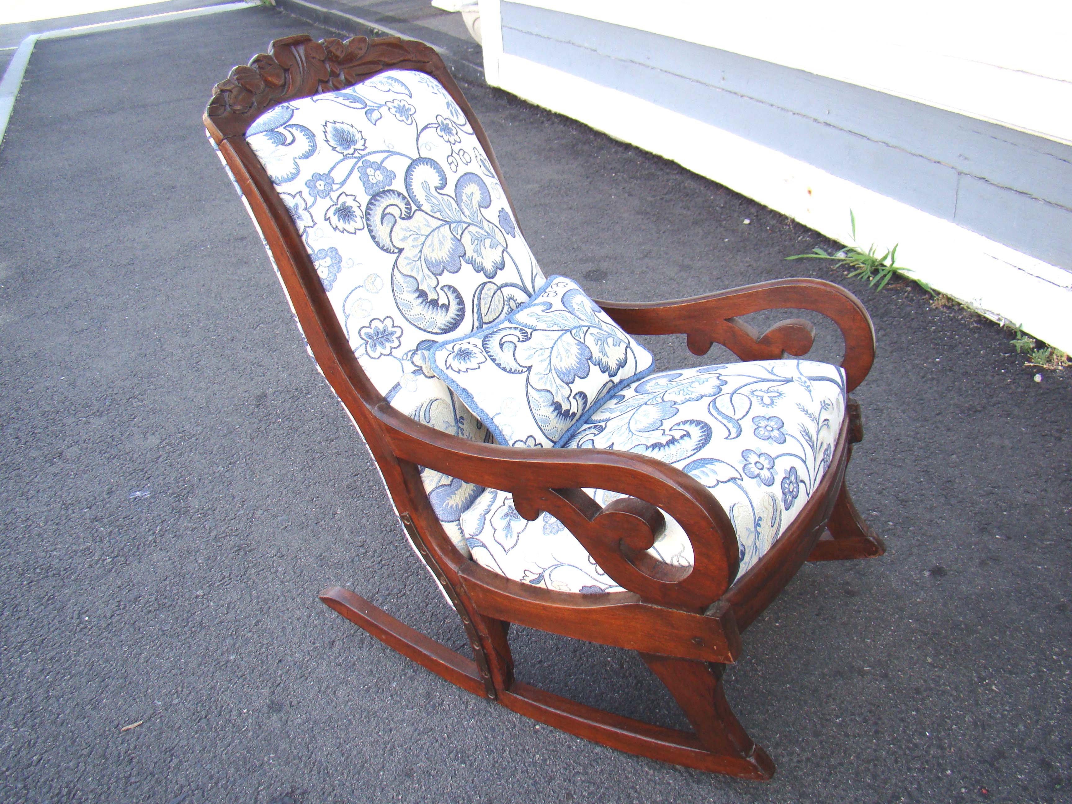 A fine Victorian child's upholstered rocking chair circa 1890